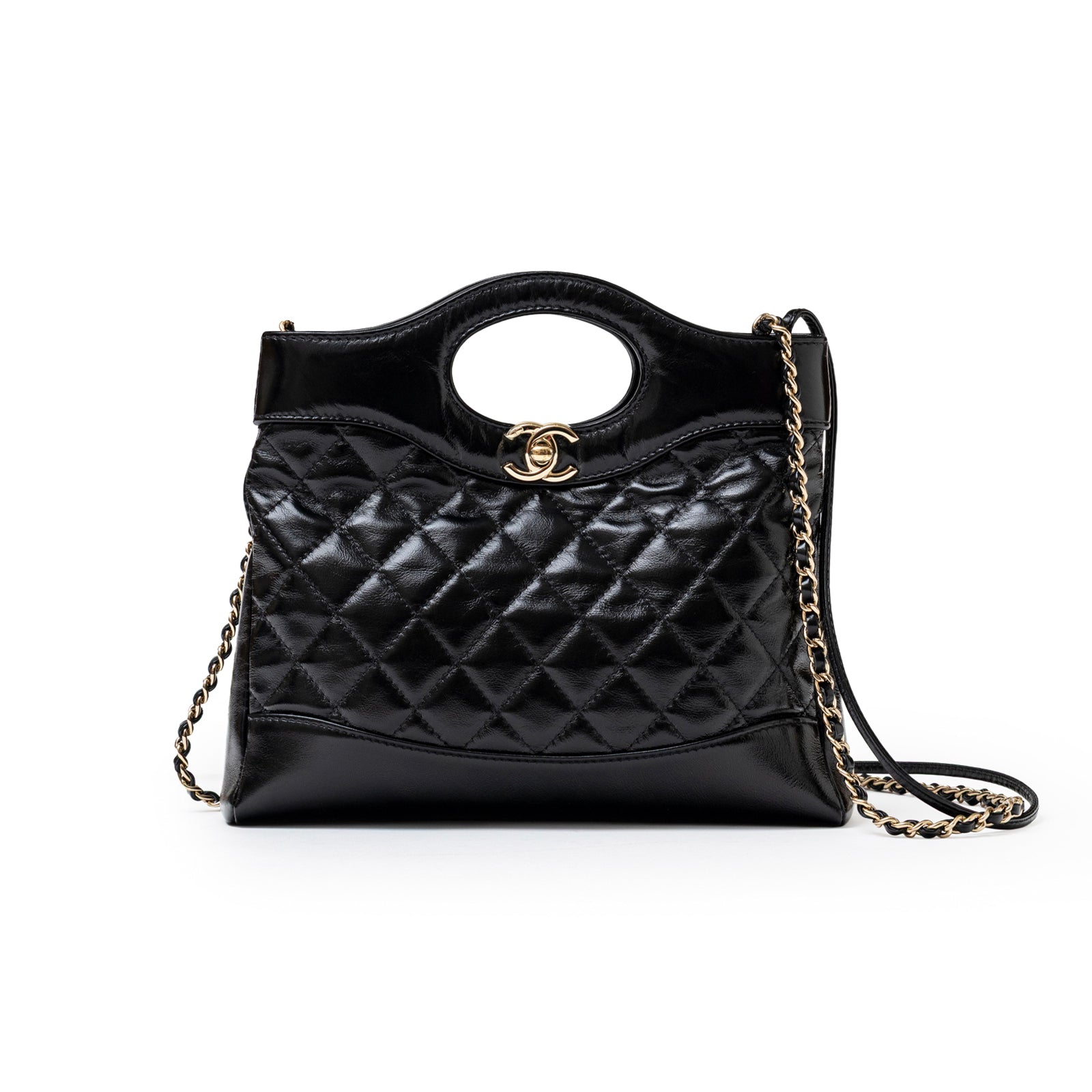 Front view of Chanel Mini 31 Shopping Tote Calfskin Black Gold Hardware with quilted leather and chain strap detail