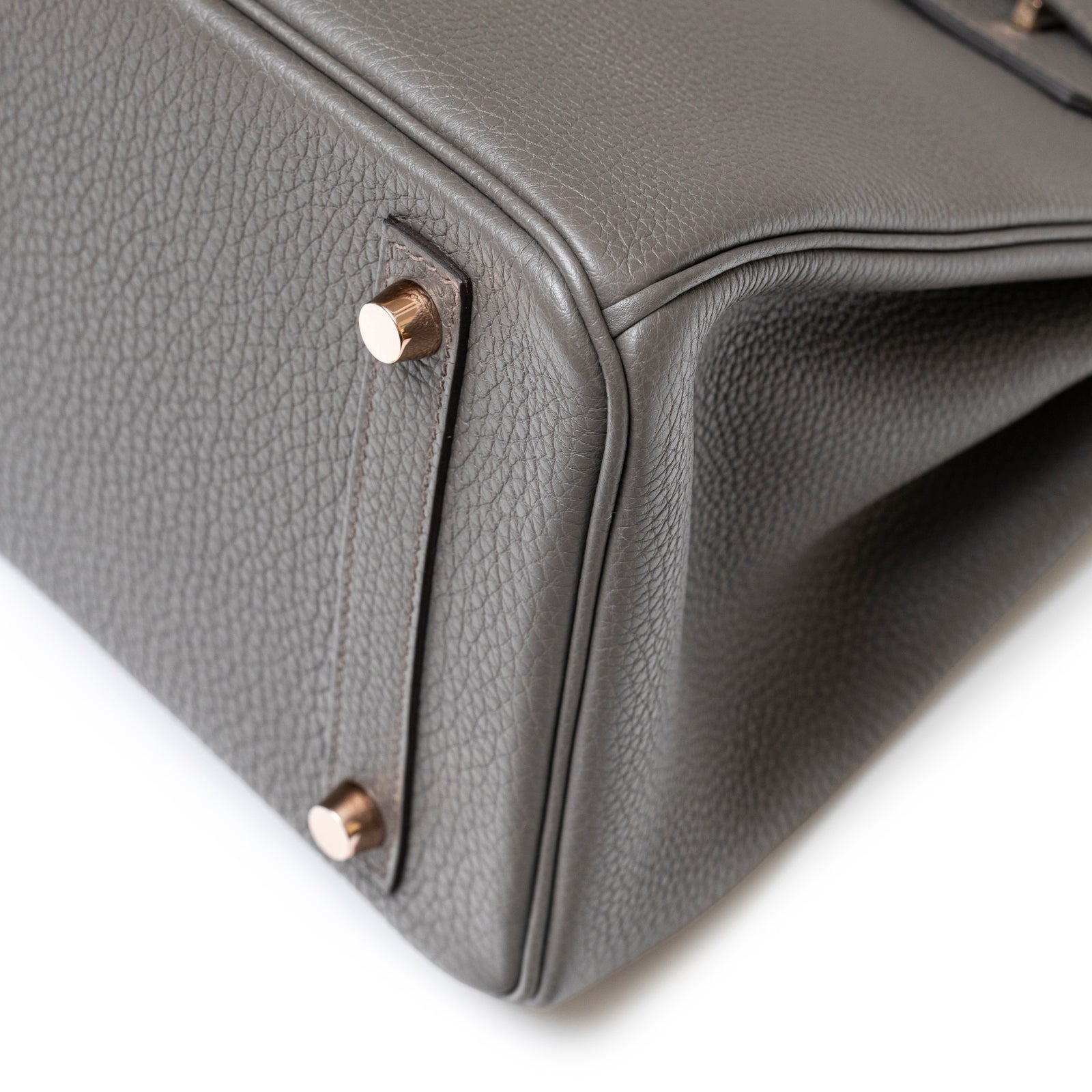 Close-up of bottom corner showing textured Etain Togo leather and rose gold hardware on Hermès Birkin 30 Etain Togo Rose Gold Hardware