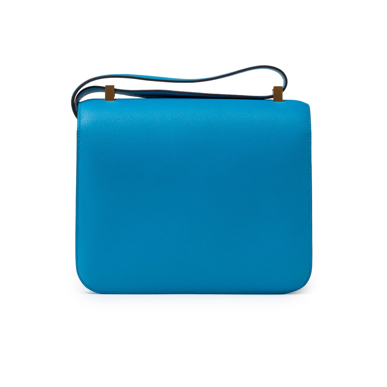 Back view of Hermès Constance 24 Blue Zanzibar Evercolor Gold Hardware with smooth leather finish and adjustable strap