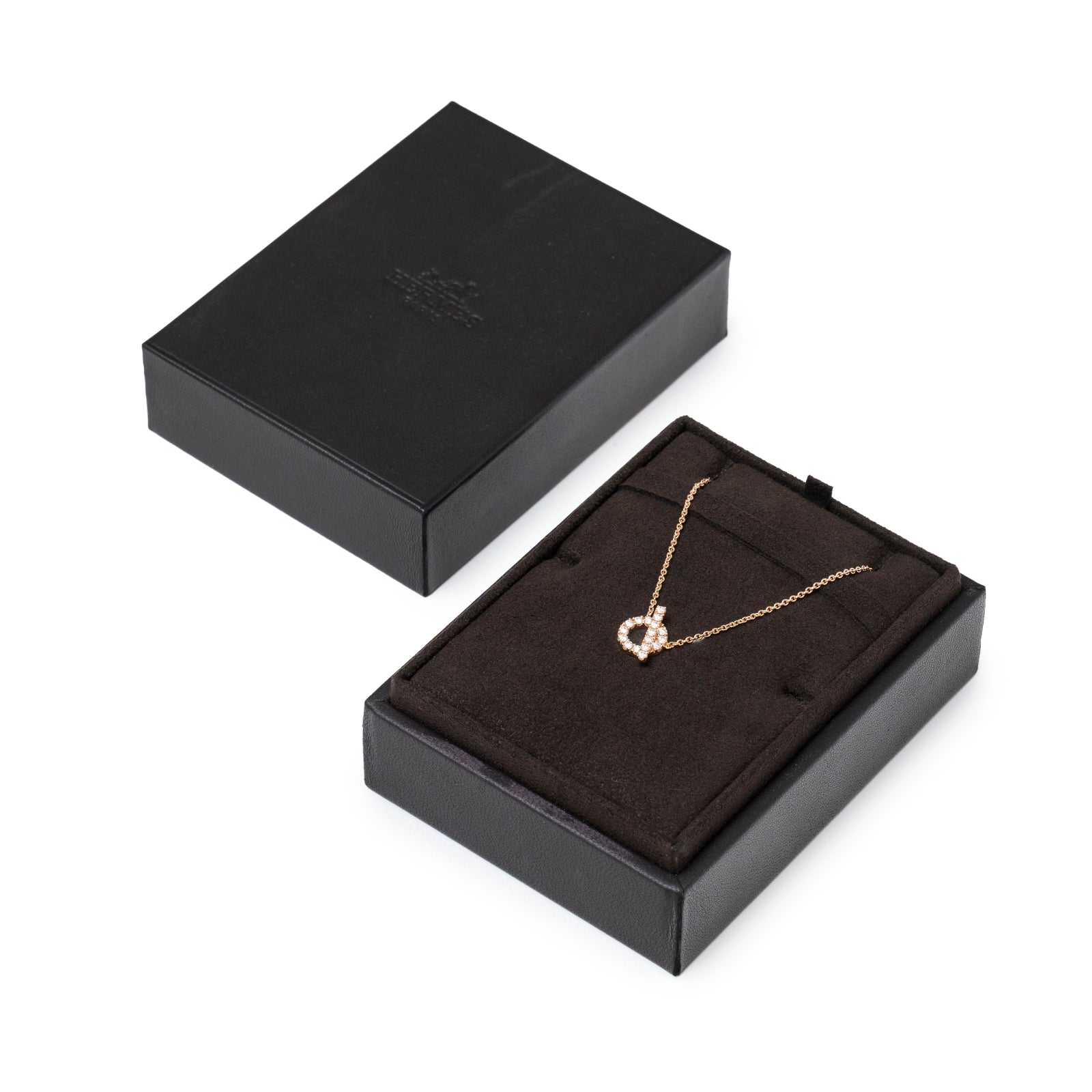 Hermès Finesse Pendant Rose Gold Au750 displayed in open black box with chain and heart-shaped motif visible