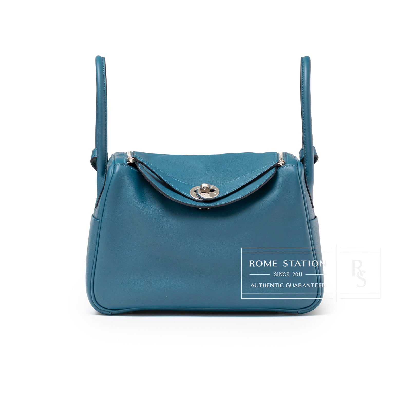 Front view of Hermès Lindy 26 Colvert Swift Palladium Hardware showing smooth leather and flap closure detail