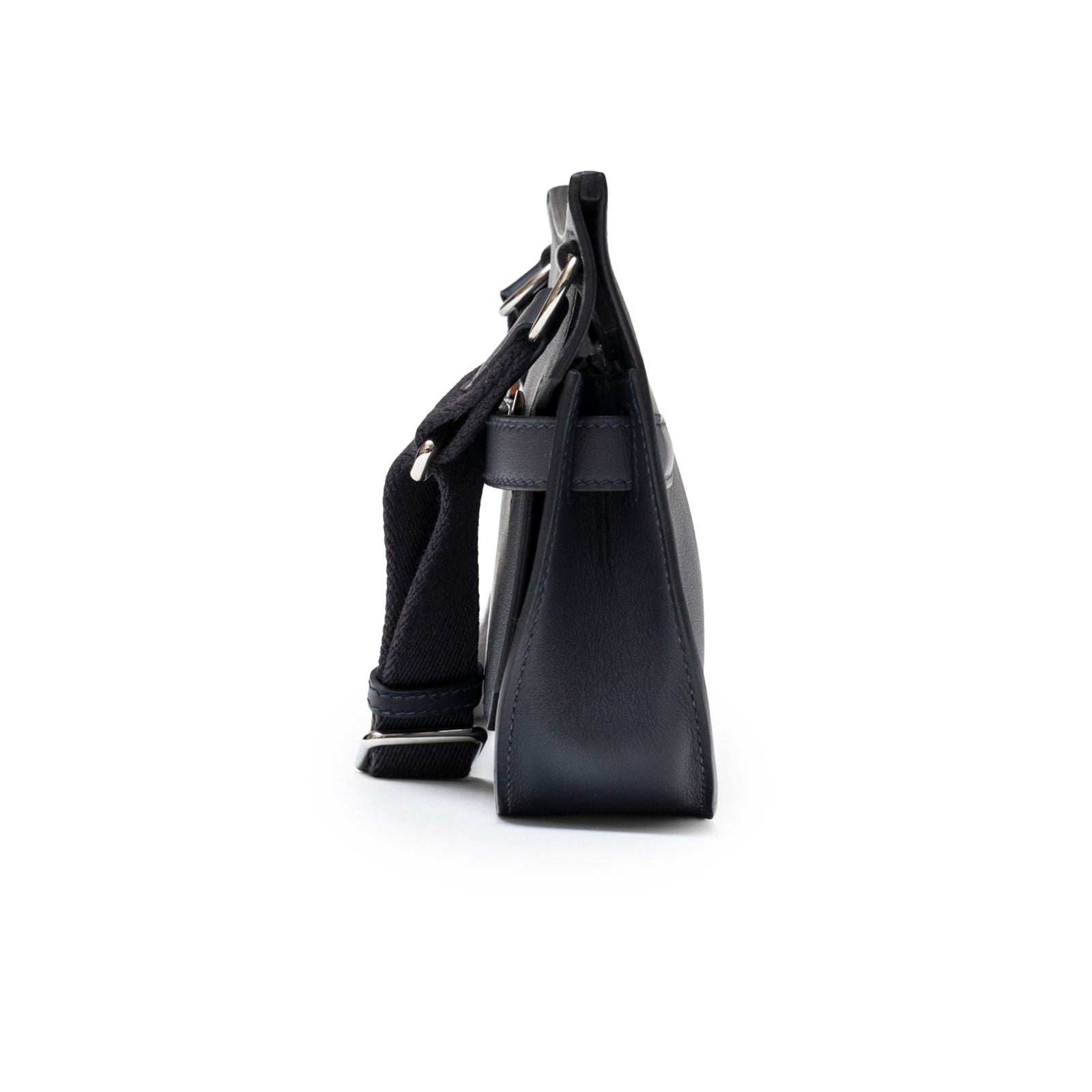 Side view of Hermès Mini Jypsiere Caban Swift Palladium Hardware showing slim profile and strap detail