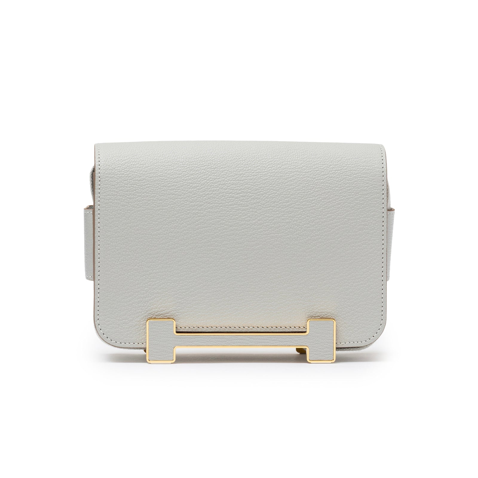 Front view of Hermès Geta Gris Perle Chevre Mysore Gold Hardware bag showing smooth leather and gold clasp detail