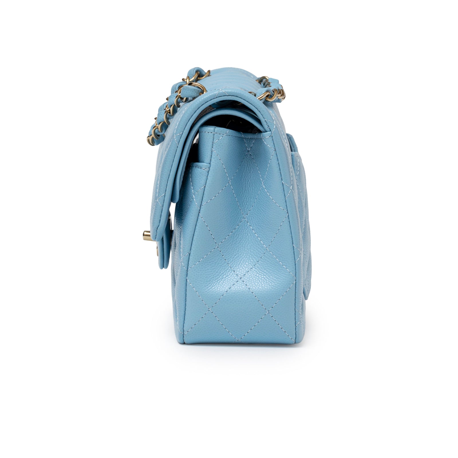 Side view of Chanel Small Classic Flap Bag Blue Caviar Light Gold Hardware showing quilted leather texture