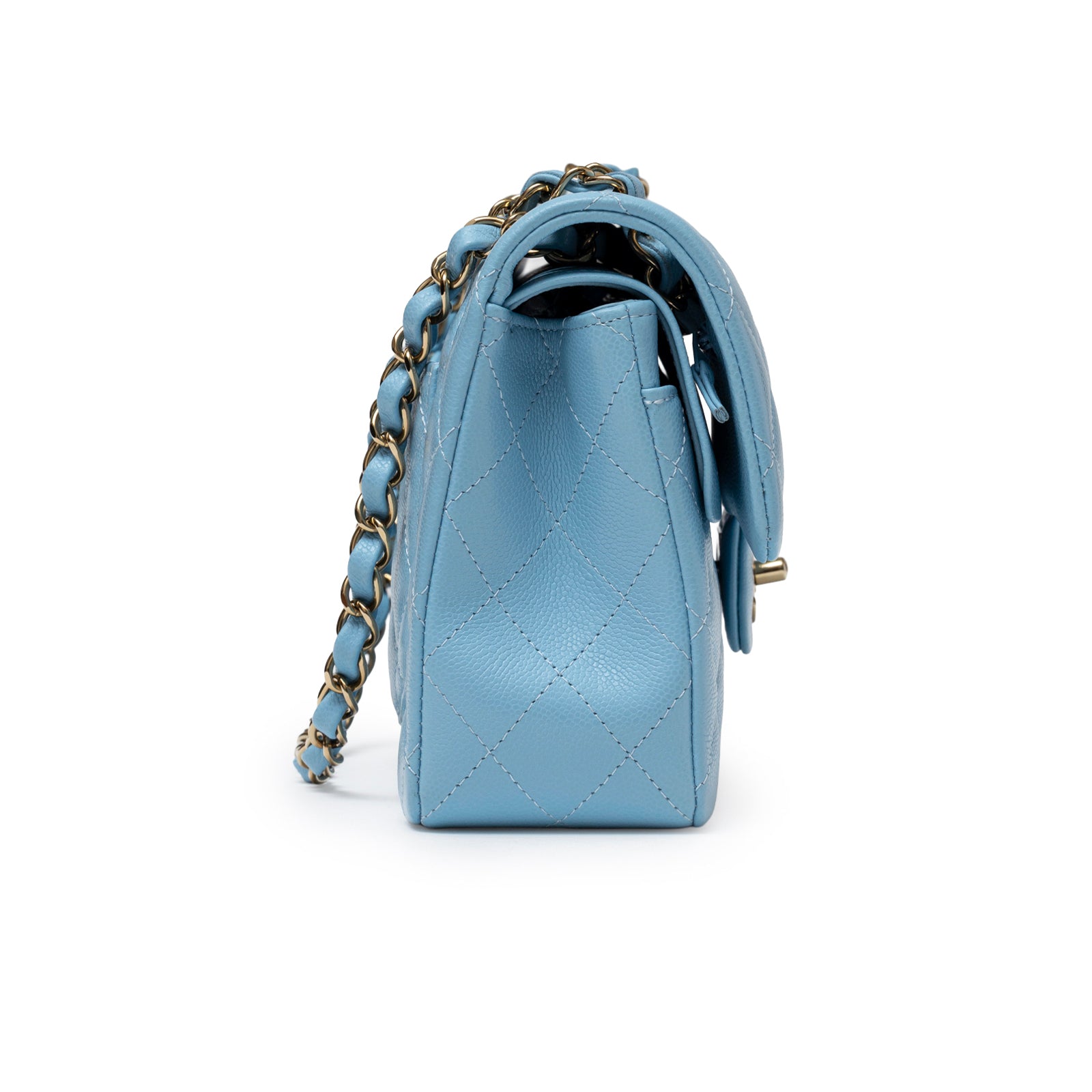 Side view of Chanel Small Classic Flap Bag Blue Caviar Light Gold Hardware showing quilted leather and chain strap