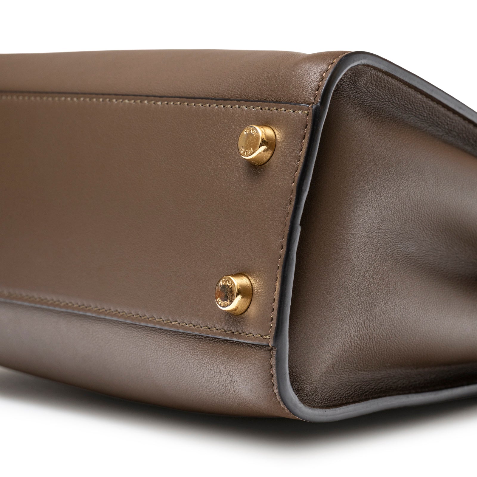 Close-up bottom view of Fendi Peekaboo ISeeU Small Tricolour Etoupe Beige Rose Calfskin Gold Hardware showing feet and stitching detail