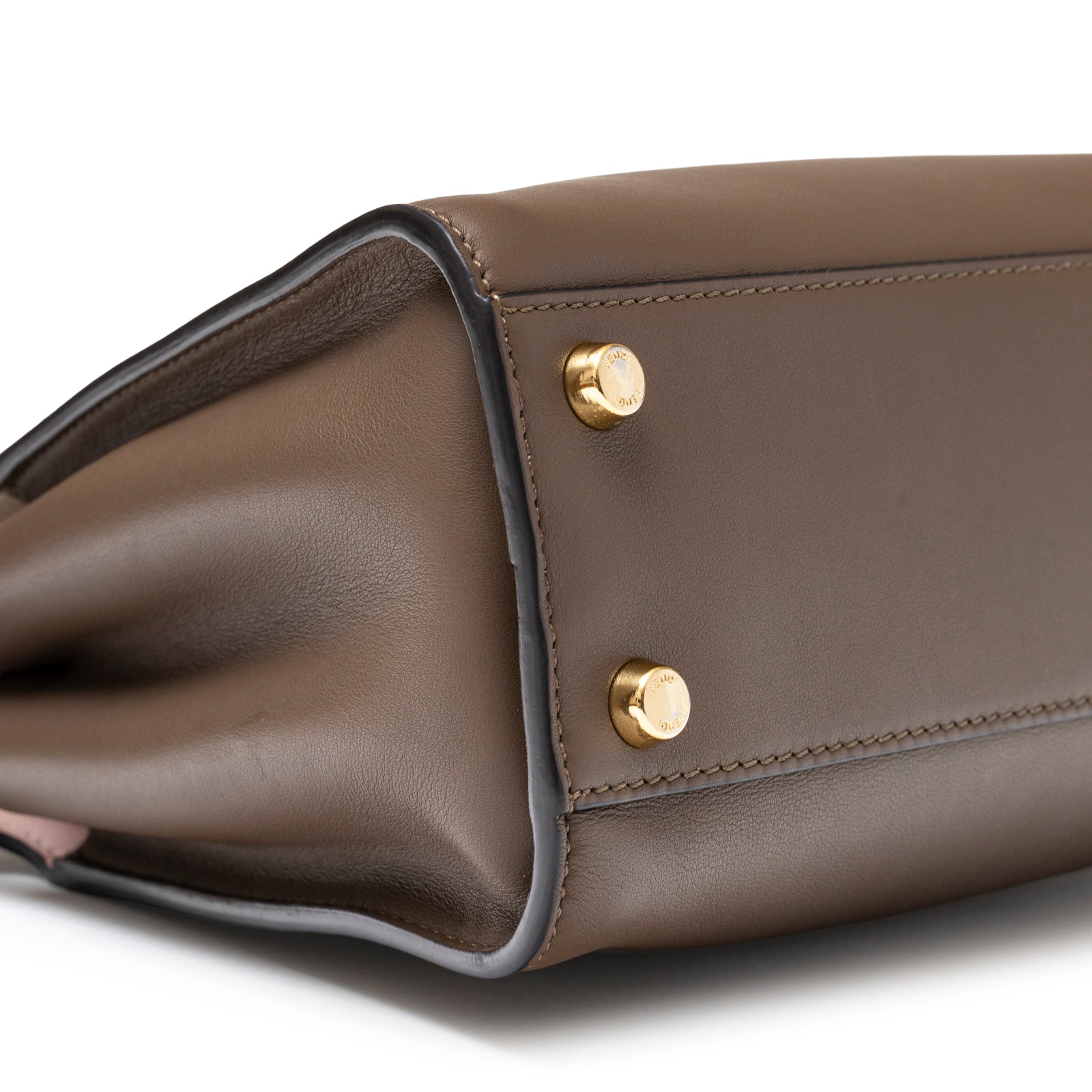 Bottom close-up view of Fendi Peekaboo ISeeU Small Tricolour Etoupe/Beige/Rose Calfskin Gold Hardware showing leather and gold feet details