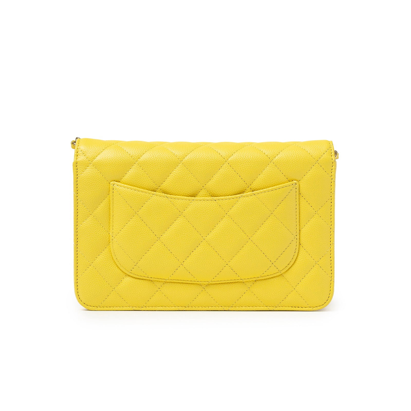 Back view of Chanel Wallet On Chain Yellow Caviar Palladium Hardware showing quilted leather and slip pocket detail