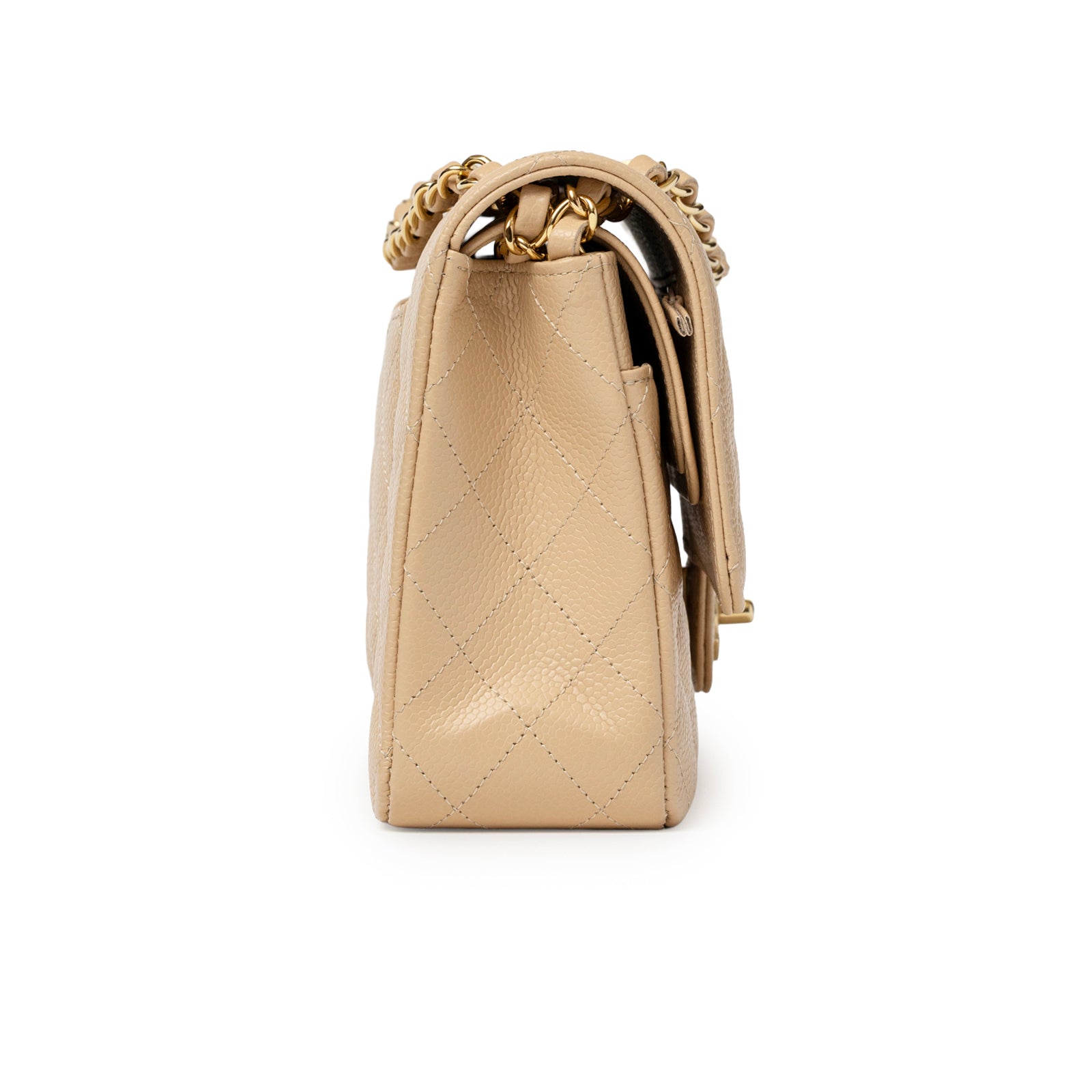 Side view of Chanel Classic Flap Medium Caviar Beige Gold Hardware quilted leather bag with chain strap