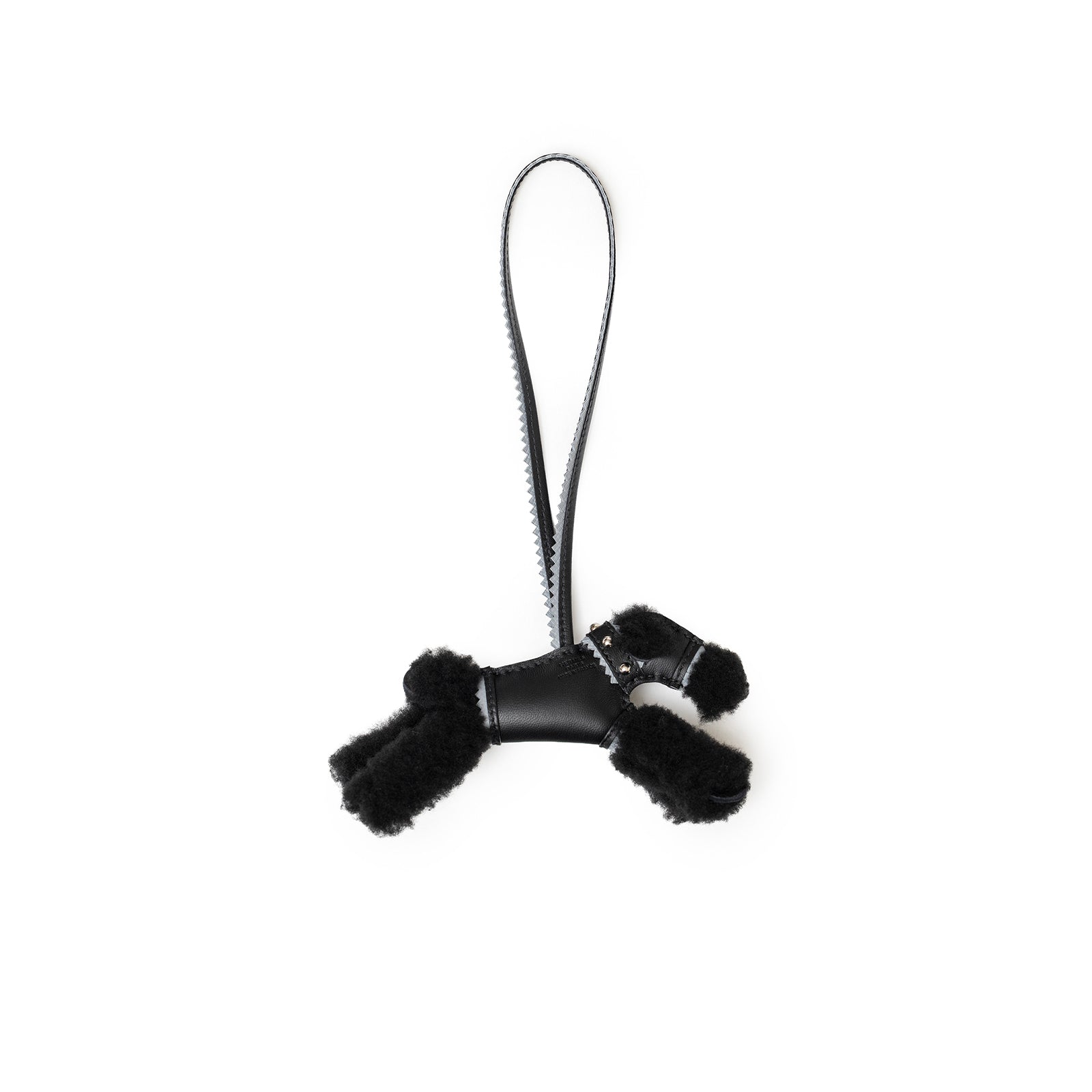 Top view of Hermès Budy Charm Black/Gris Pantin Milo Lambskin/Epsom shaped like a poodle with leather strap loop