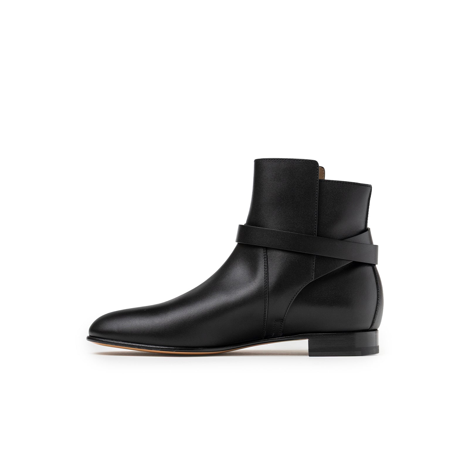 Side view of Hermès Kelly Neo Ankle Boot Black Palladium Plated showing smooth calf leather and sleek strap detail