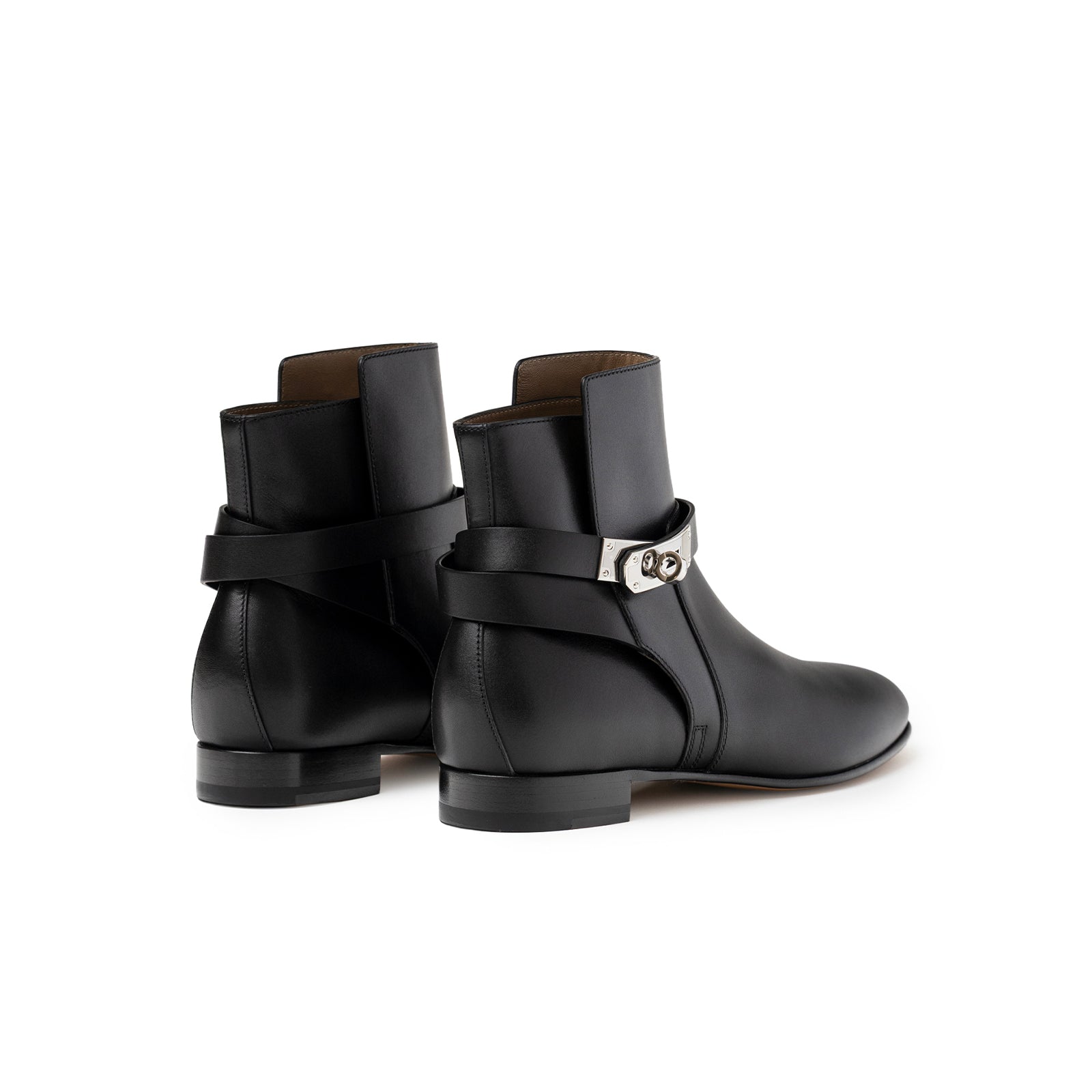 Angled rear view of Hermès Kelly Neo Ankle Boot Black Palladium Plated showing smooth leather and hardware detail