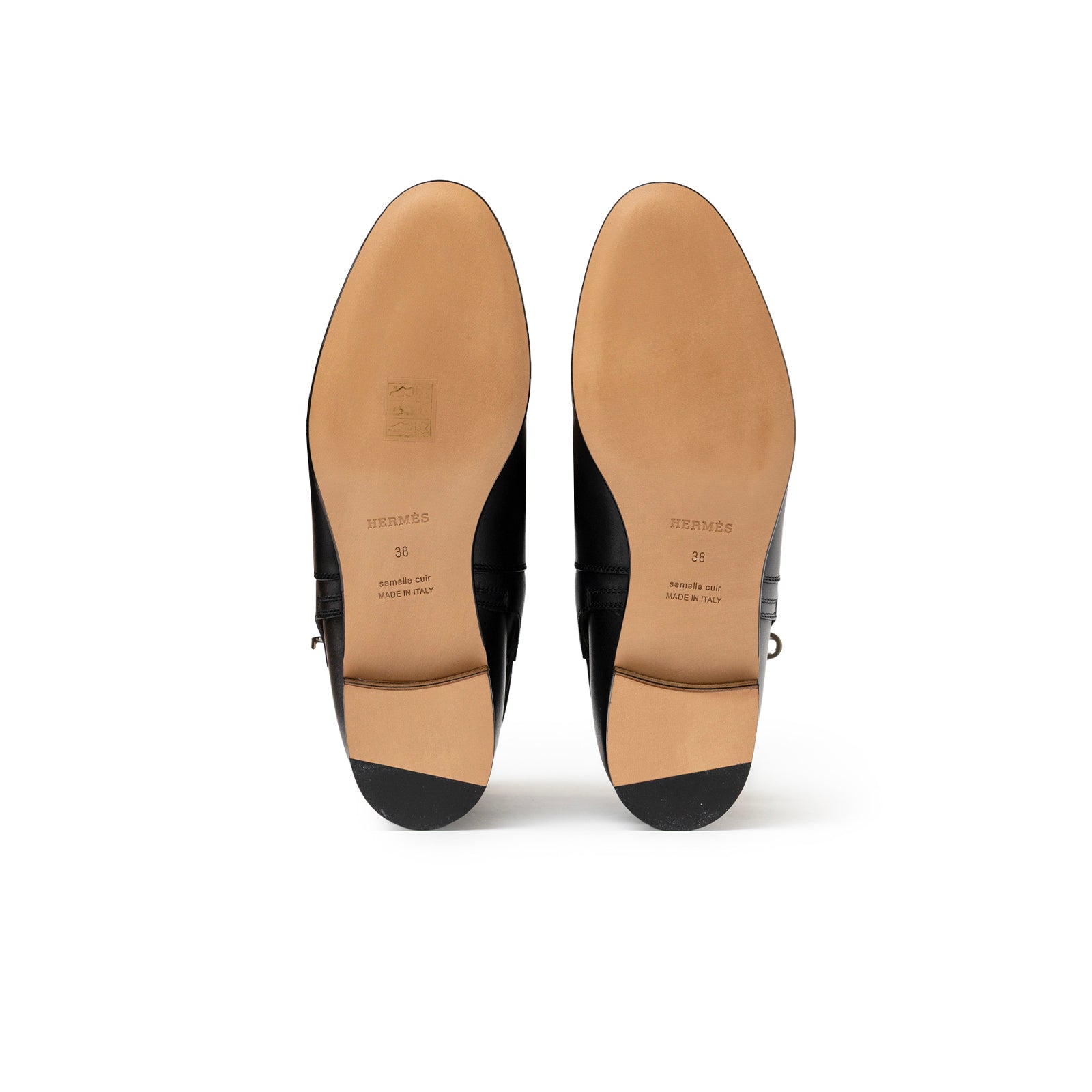 Bottom view of Hermès Kelly Neo Ankle Boot Black Palladium Plated showing smooth leather soles and heel details