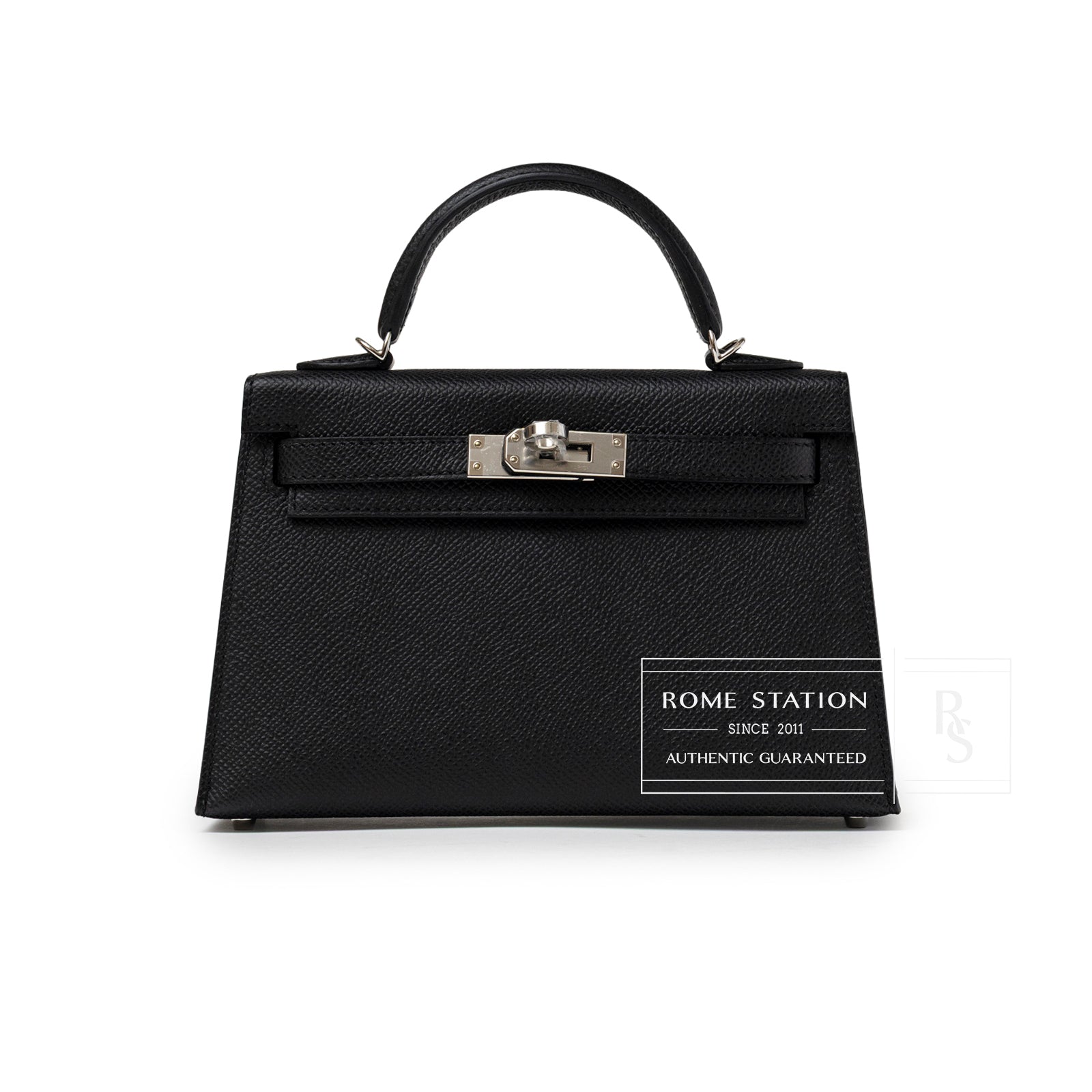 Front view of Hermès Mini Kelly II Sellier Black Epsom leather handbag with palladium hardware on white background