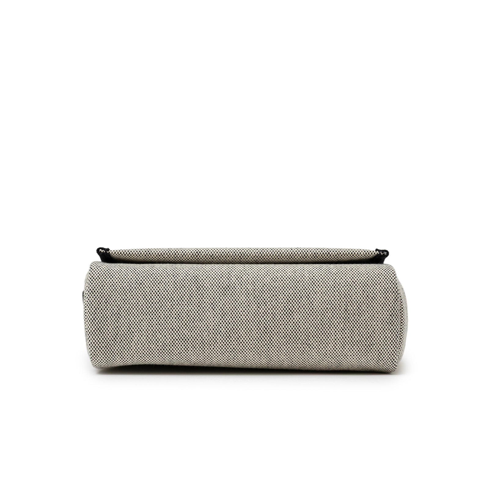 Bottom view of Hermès Mini Herbag Zip 20 Ecru/Black Toile and Vache Hunter Palladium Hardware showing base texture detail