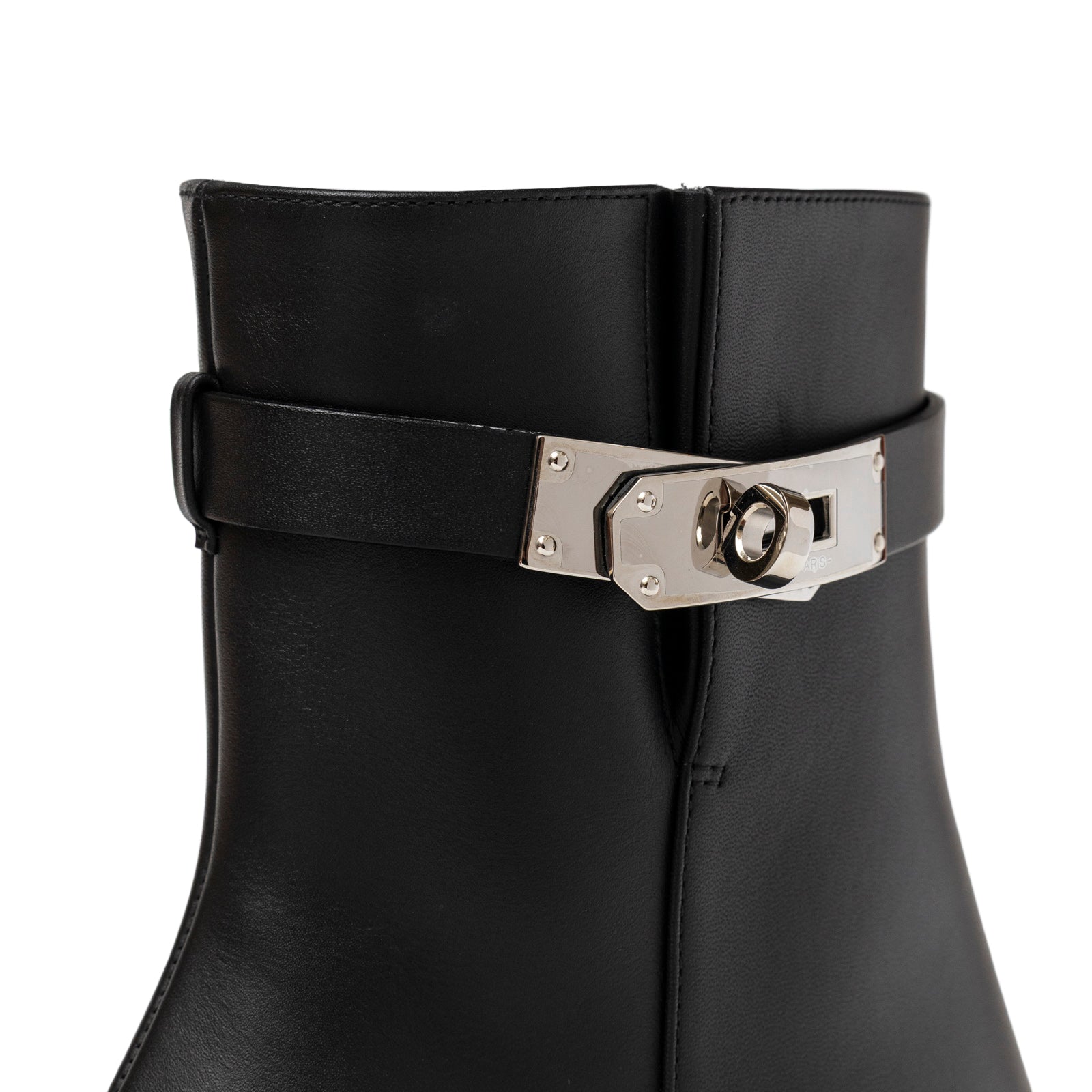 Close-up angled view of Hermès Kelly Saint Germain Ankle Boot Black Palladium Plated hardware detail on smooth leather