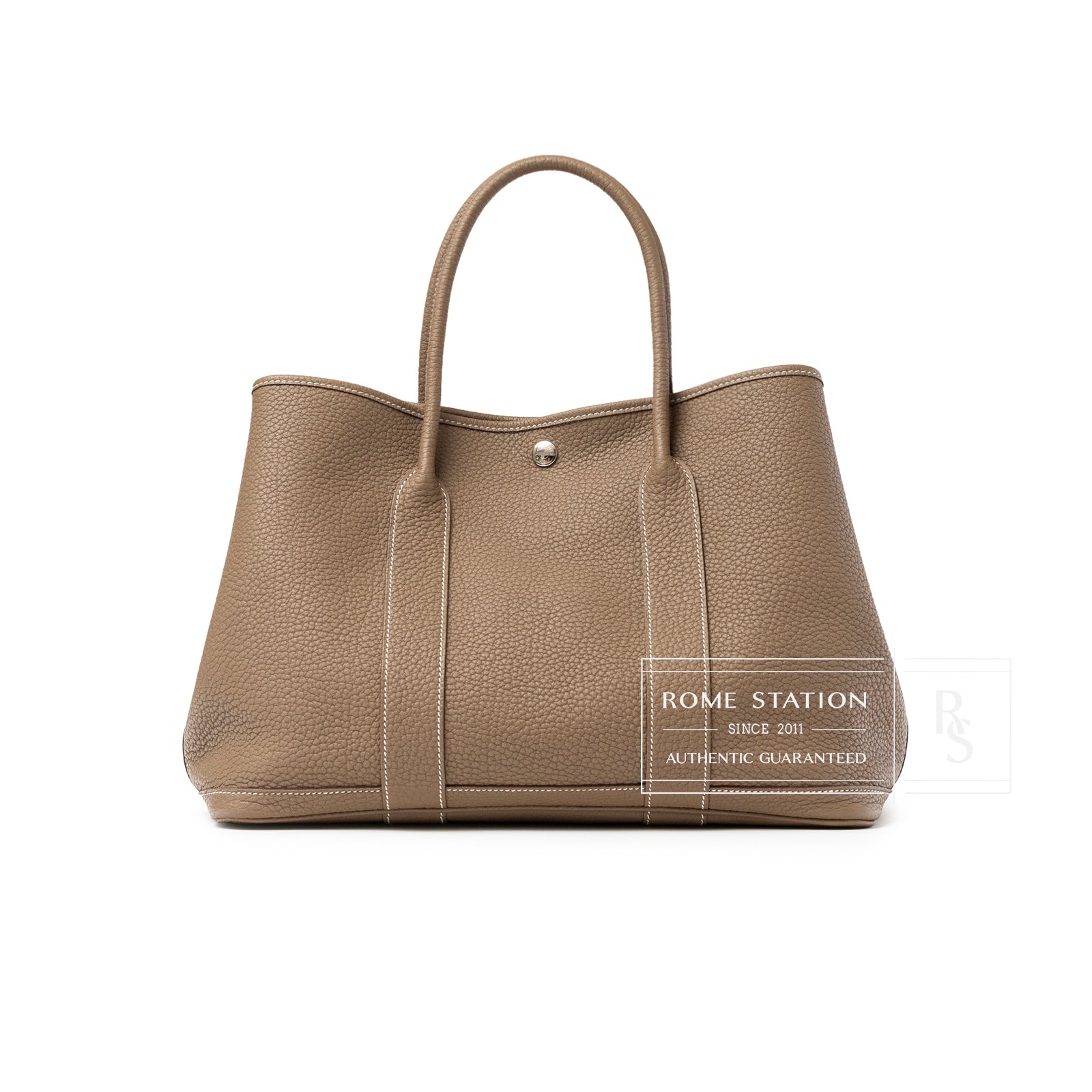 Front view of Hermès Garden Party 36 Etoupe Negonda Palladium Hardware tote with textured leather surface
