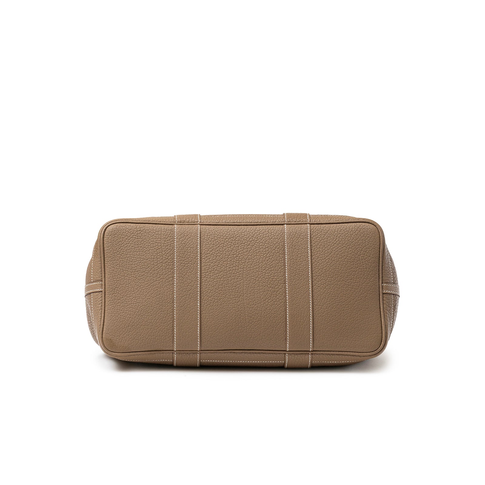 Bottom view of Hermès Garden Party 36 Etoupe Negonda Palladium Hardware showing leather texture and stitching details