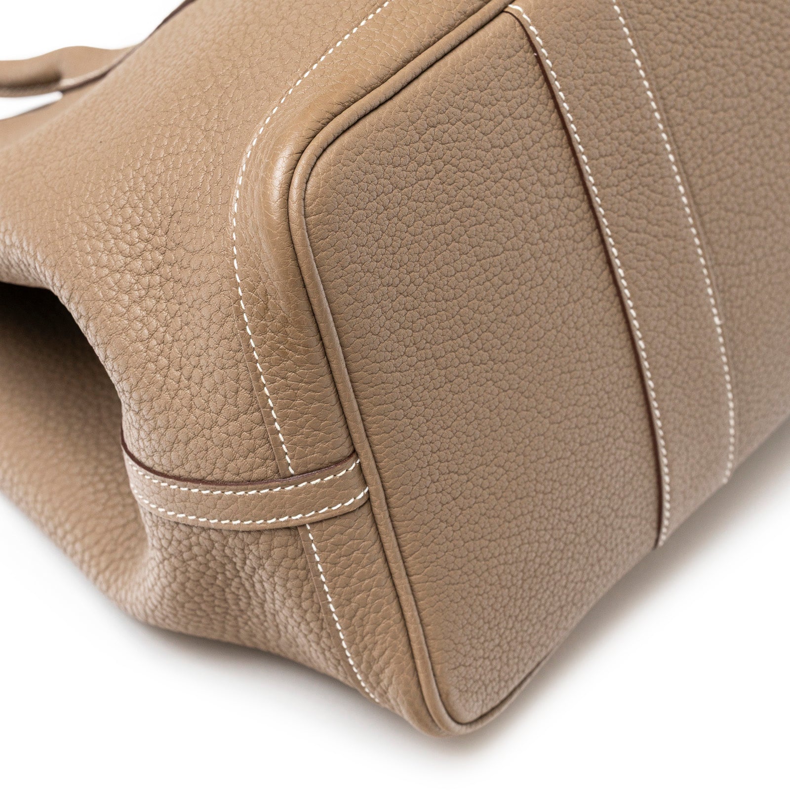 Close-up angled shot of Hermès Garden Party 36 Etoupe Negonda Palladium Hardware showing textured leather and stitching detail