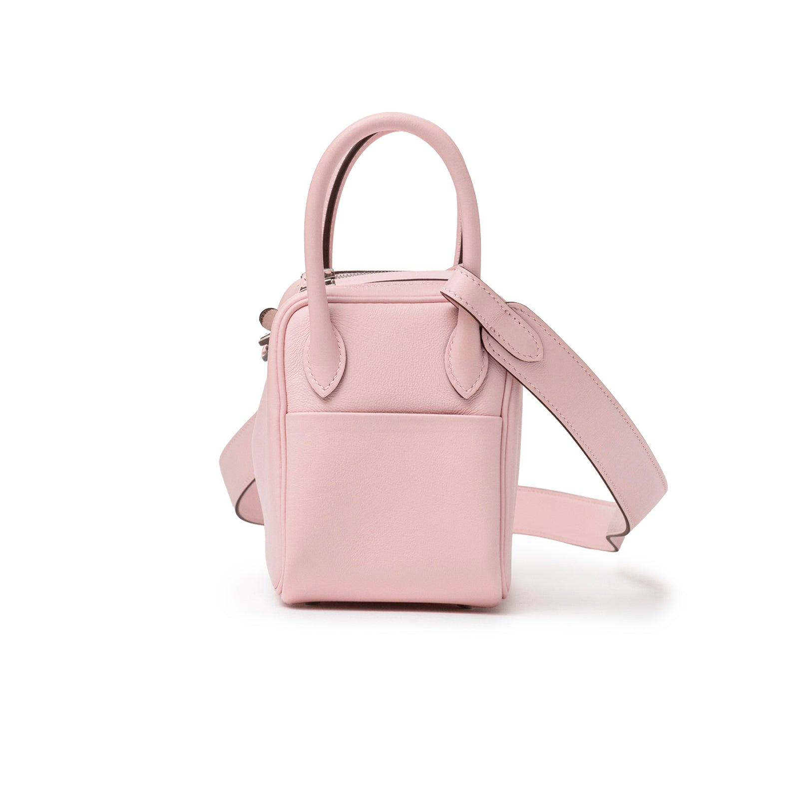 Side view of Hermès Mini Lindy II Rose Sakura Swift Palladium Hardware showing compact shape and exterior pocket