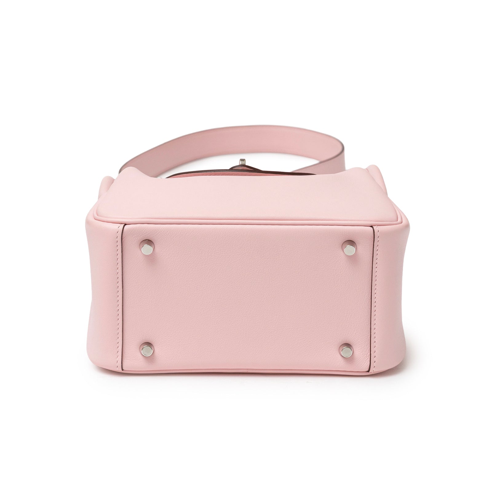 Bottom view of Hermès Mini Lindy II Rose Sakura Swift Palladium Hardware showing base and feet details