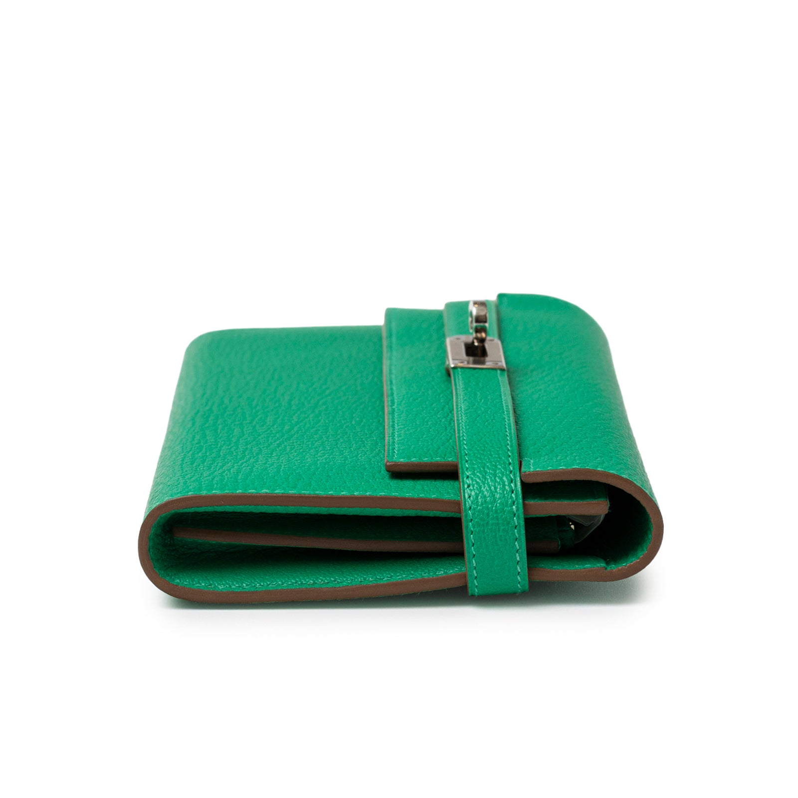 Side view of Hermès Kelly Long Wallet Menthe Chevre Mysore Palladium Hardware folded with strap visible