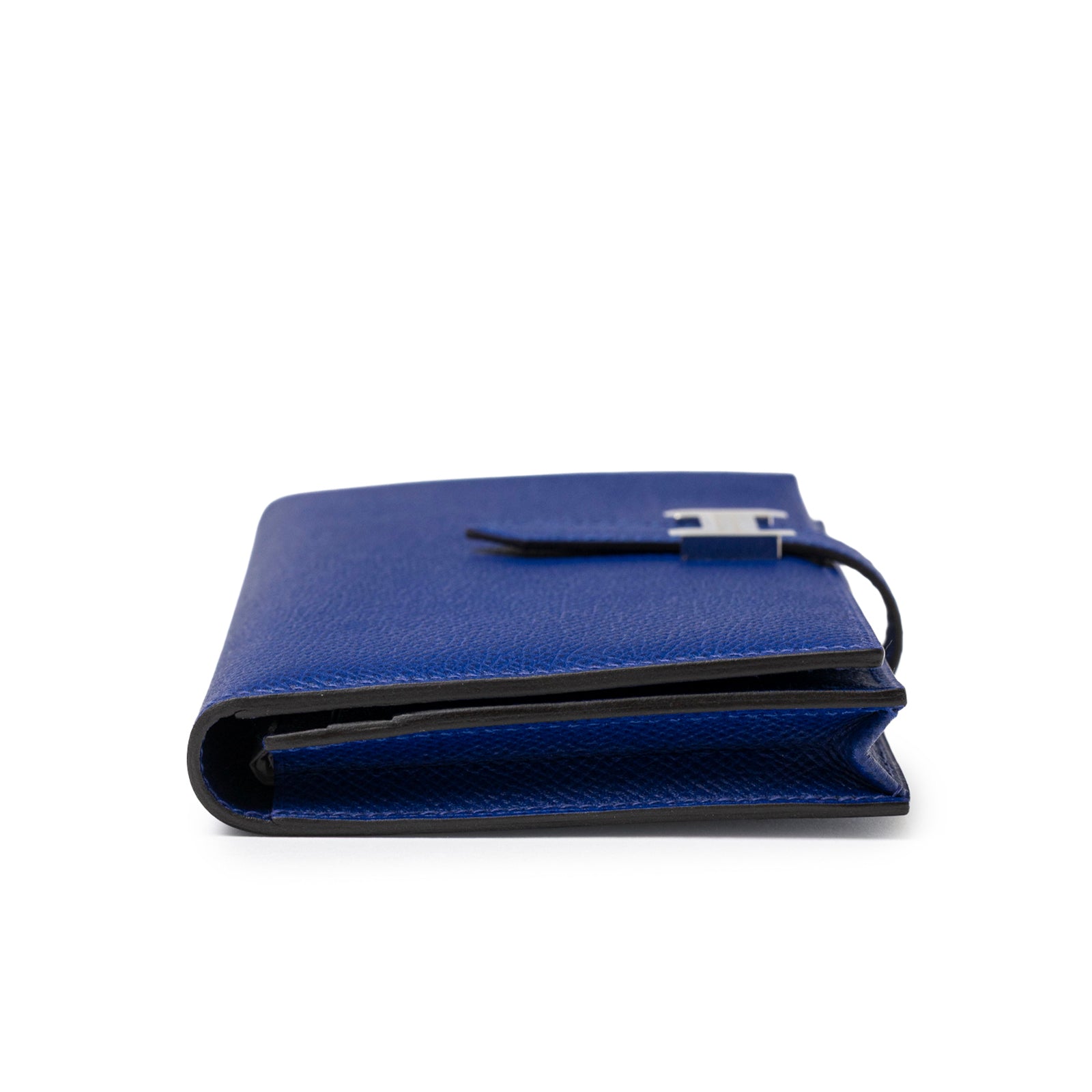 Side view of Hermès Bearn Wallet Blue Electric Epsom Palladium Hardware folded showing sleek edges