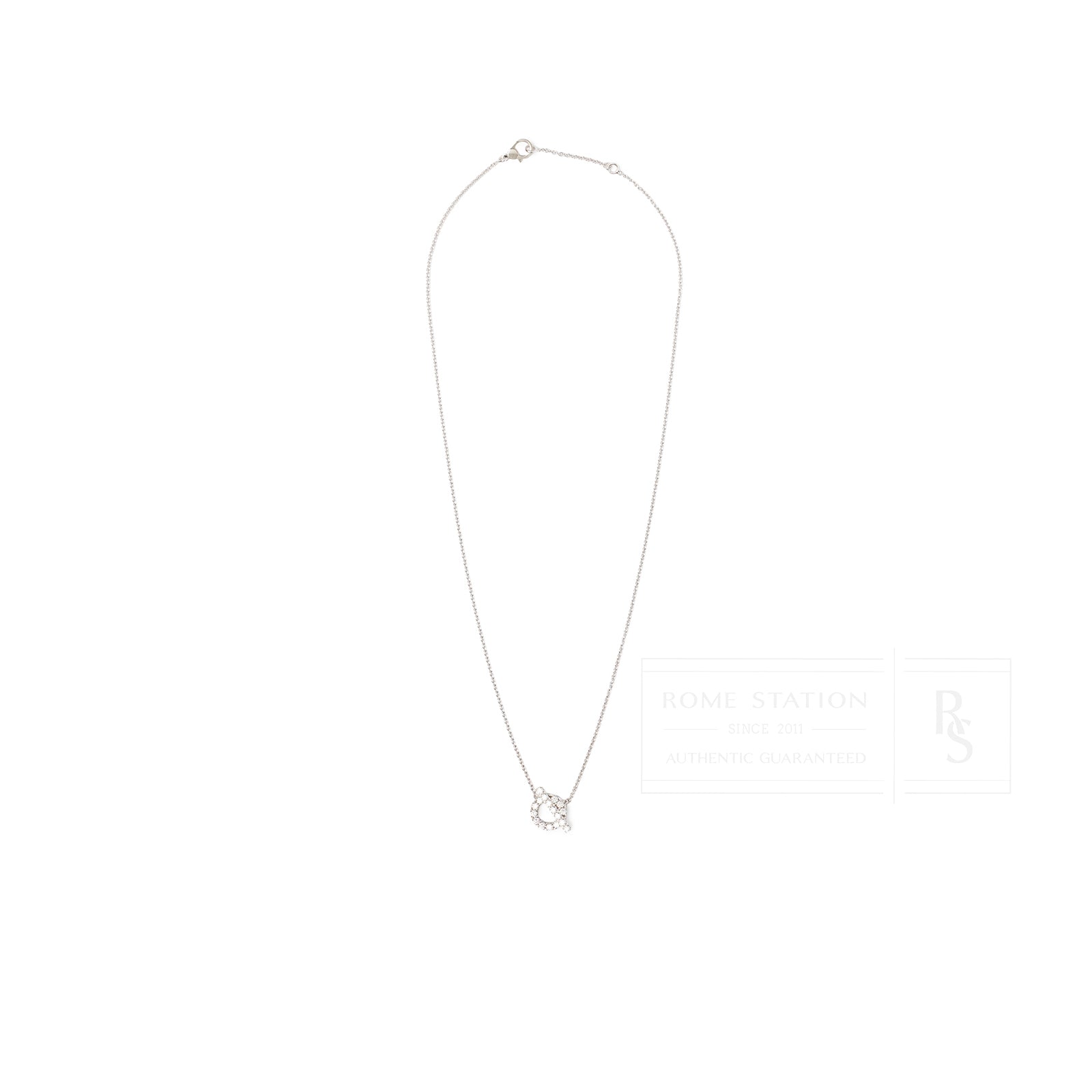 Top-down view of Hermès Finesse Pendant Diamonds and 18k White Gold necklace with delicate diamond pendant