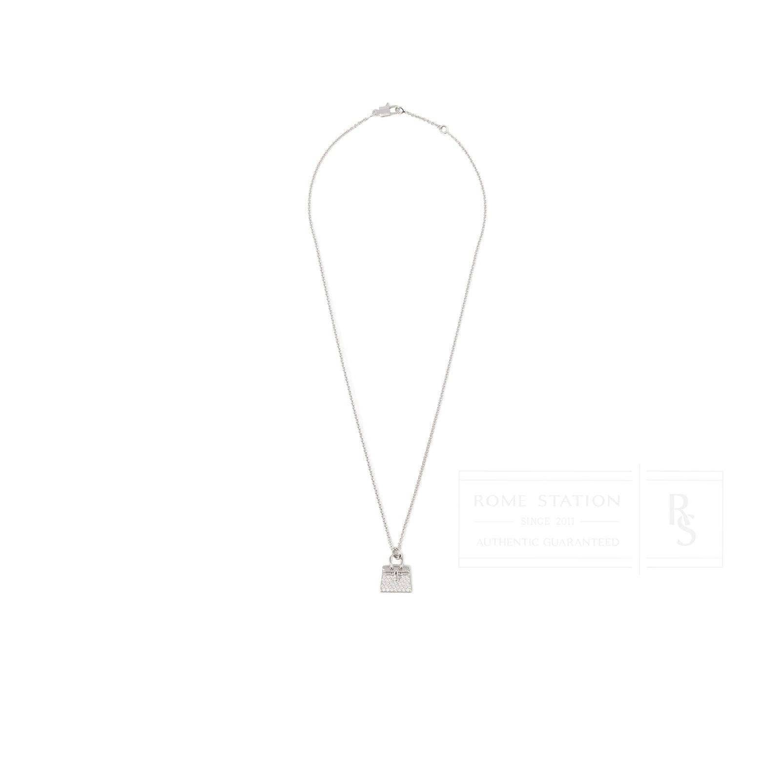 Front view of Hermès Amulettes Birkin Pendant Diamonds and 18k White Gold necklace with diamond-studded bag motif