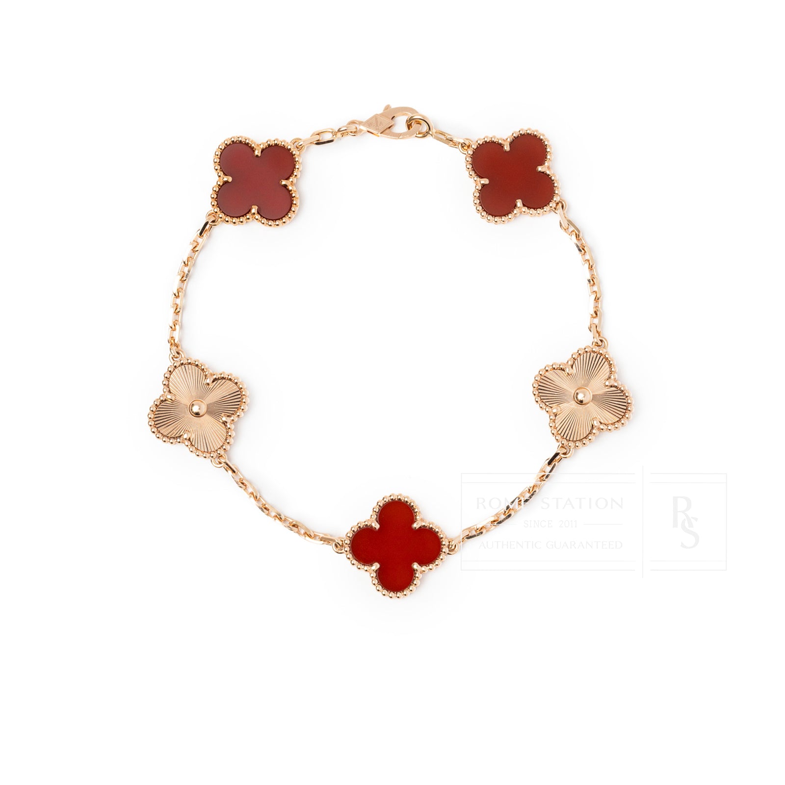Top-down view of Van Cleef & Arpels Vintage Alhambra 5 Motifs Bracelet 18K Rose Gold Carnelian/Guilloche with alternating motifs