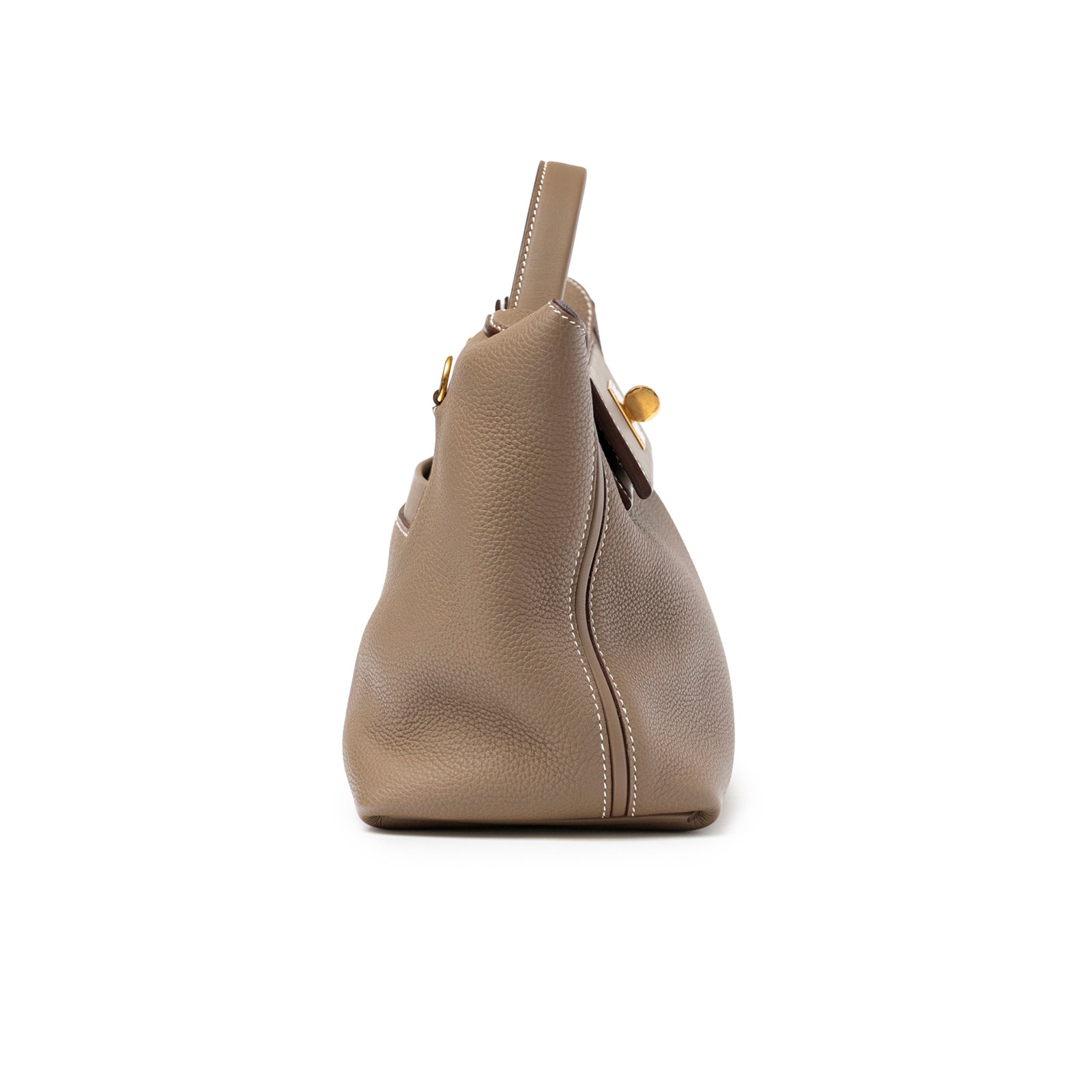 Side view of Hermès 24/24 29 Etoupe Togo and Swift Gold Hardware handbag showing textured leather and stitching detail