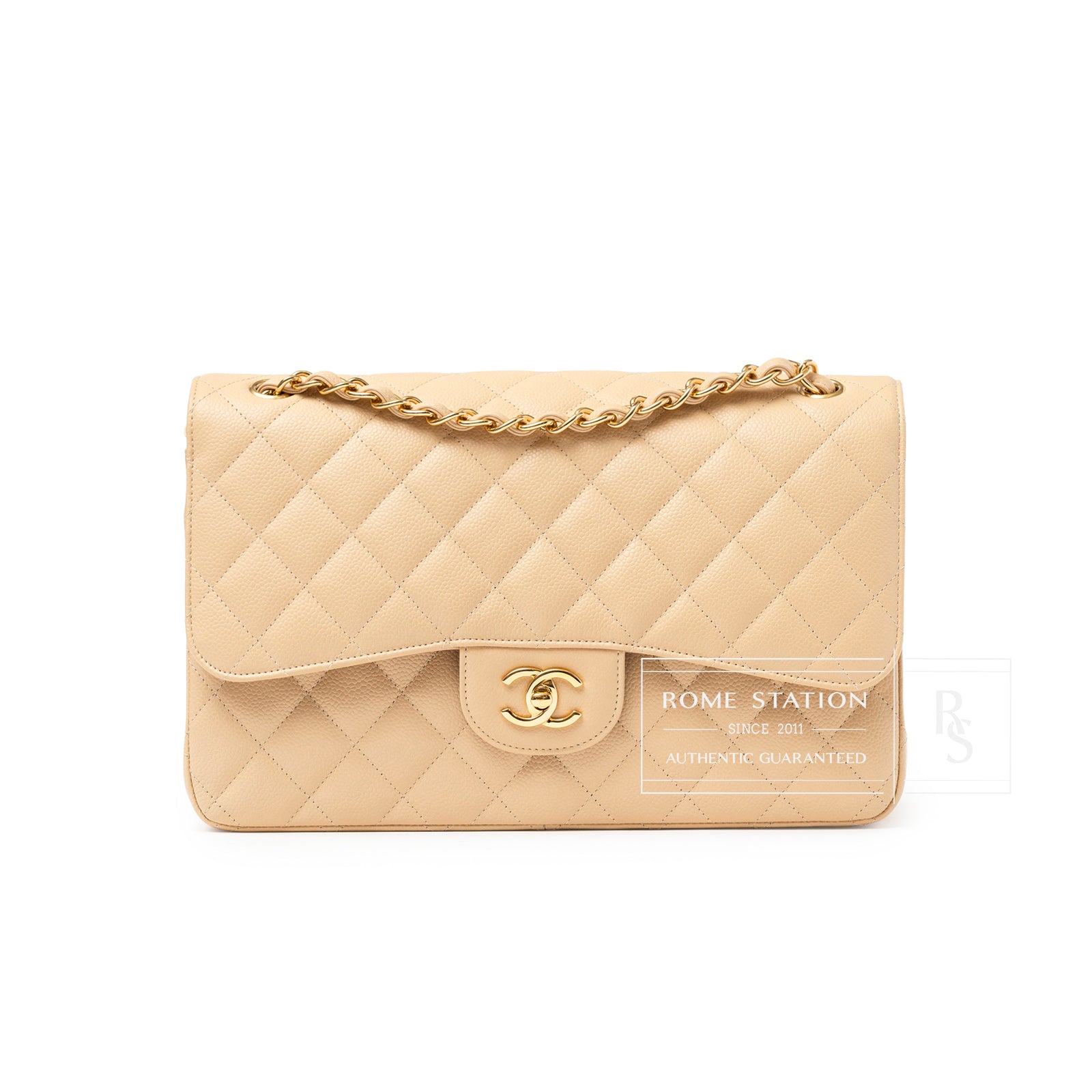 Front view of Chanel Classic Flap Jumbo Caviar Beige Gold Hardware bag with quilted pattern and chain strap