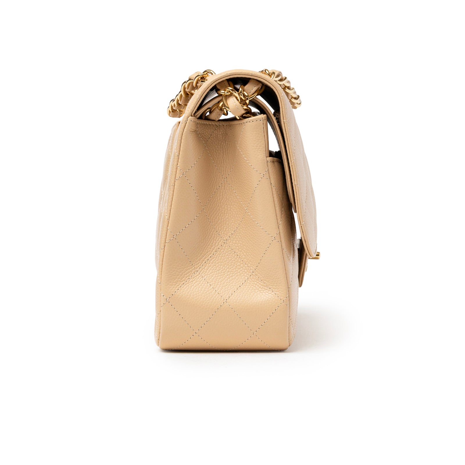 Side view of Chanel Classic Flap Jumbo Caviar Beige Gold Hardware showing quilted texture and chain strap detail