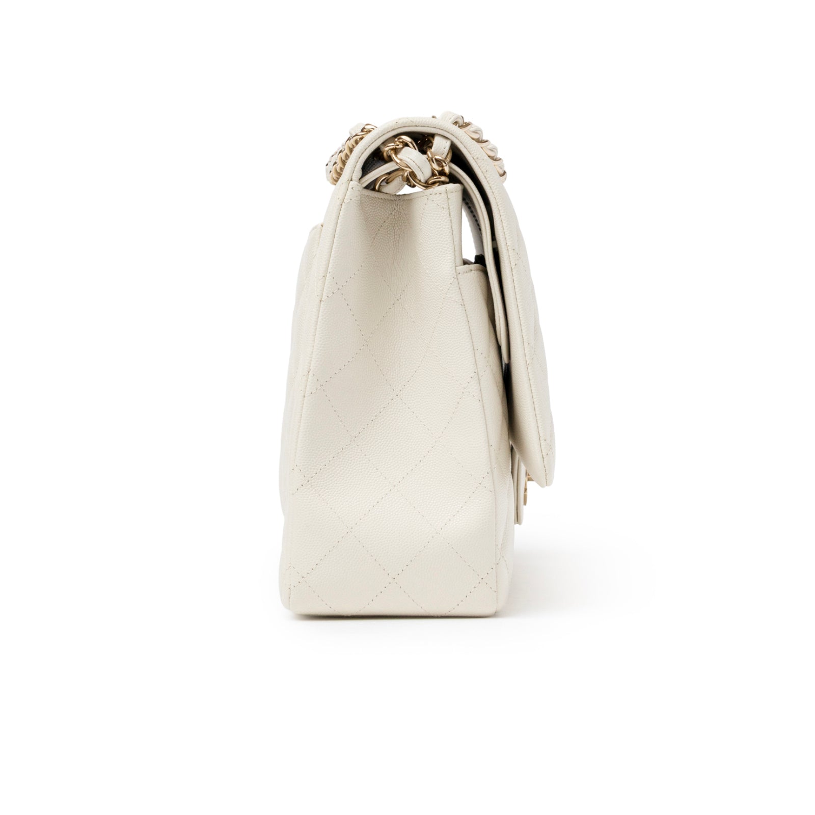 Side view of Chanel Classic Flap Maxi Caviar White Gold Hardware showing quilted leather and chain strap detail