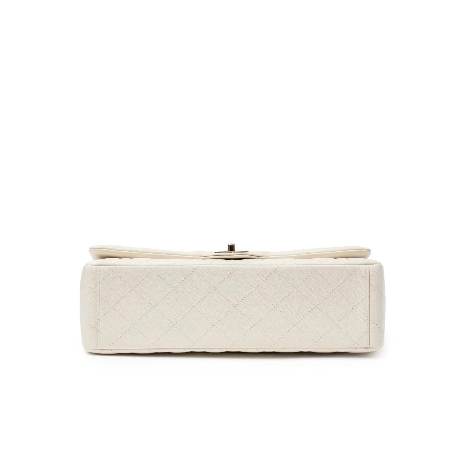 Bottom view of Chanel Classic Flap Maxi Caviar White Gold Hardware showing quilted leather base details