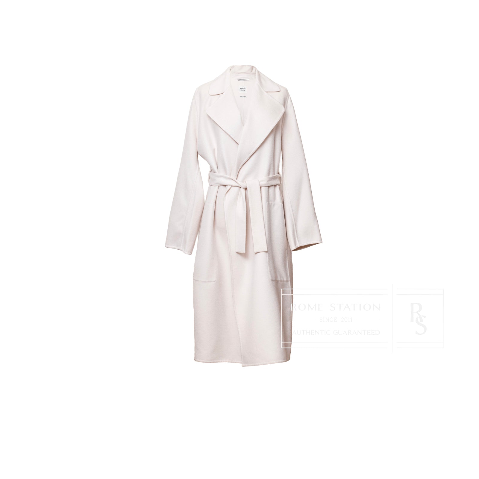 Front view of Hermès Manteau Esprit Peignoir Cashmere Doubleface Coat in light beige with belt and lapel collar