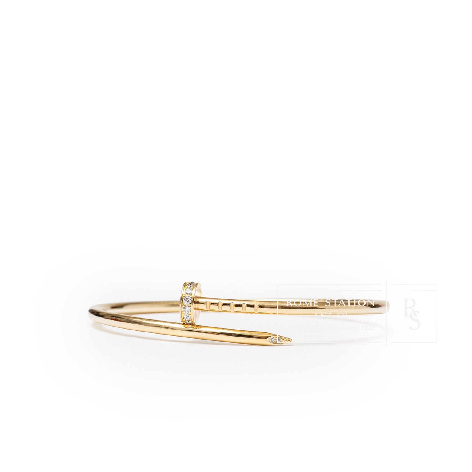 Close-up side view of Cartier Juste un Clou bracelet Small Model Yellow Gold/Diamonds with diamond accents