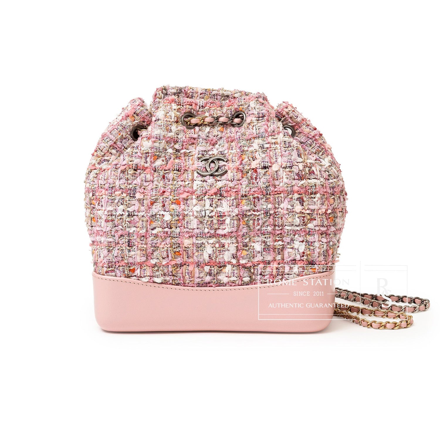 Front view of Chanel 19S Backpack Pink Tweed Palladium and Gold Hardware with drawstring closure and leather base