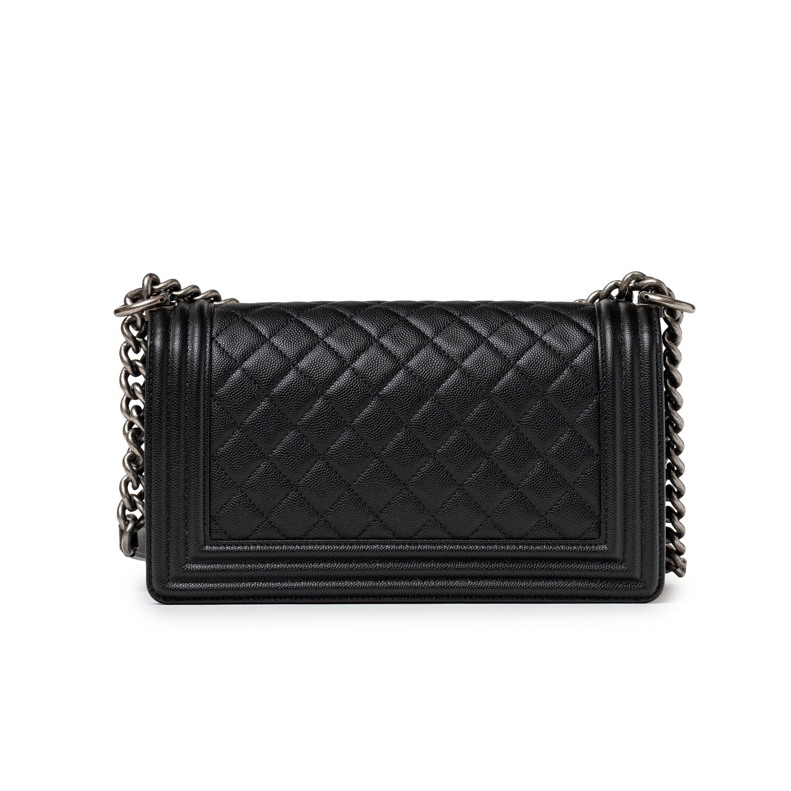 Back view of the Chanel Boy Bag Medium Black Caviar Aged Ruthenium Hardware showing quilted texture and chain strap