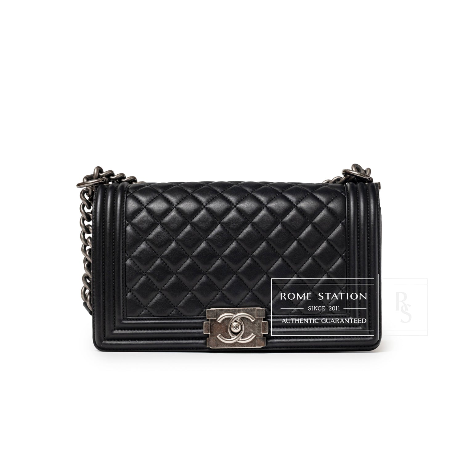 Front view of Chanel Boy Bag Medium Black Lambskin Ruthenium Hardware with quilted leather and clasp details