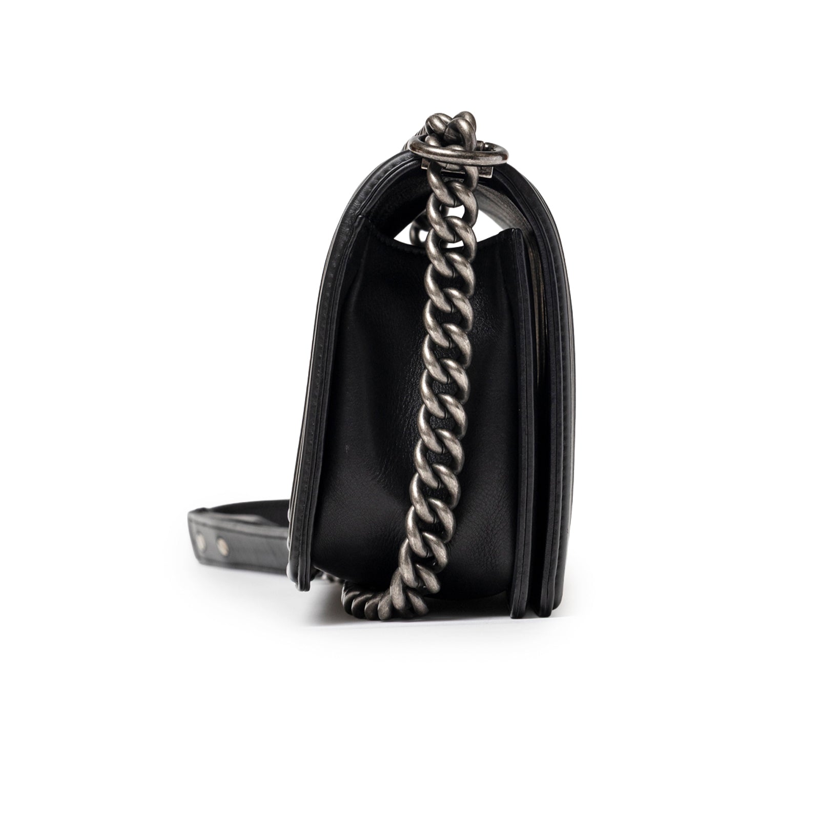 Side view of Chanel Boy Bag Medium Black Lambskin Ruthenium Hardware showing chain and leather strap details