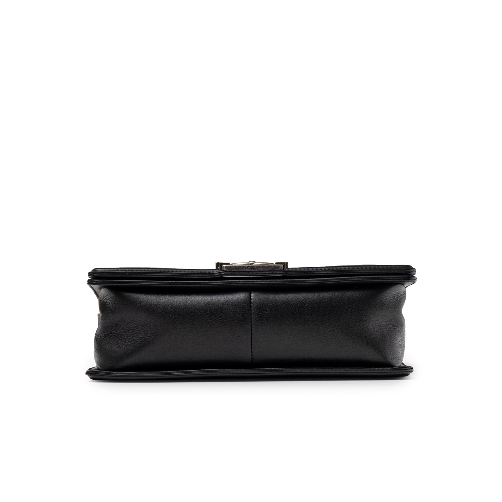 Bottom view of Chanel Boy Bag Medium Black Lambskin Ruthenium Hardware showing smooth leather base