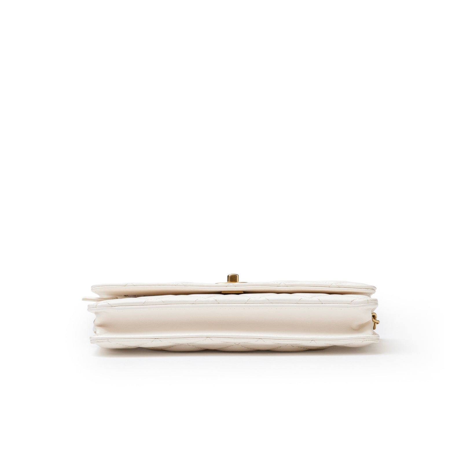 Side profile of Chanel CC Pearl Crush Wallet on Chain WOC Quilted Lambskin White Brushed Gold Hardware showing slim design