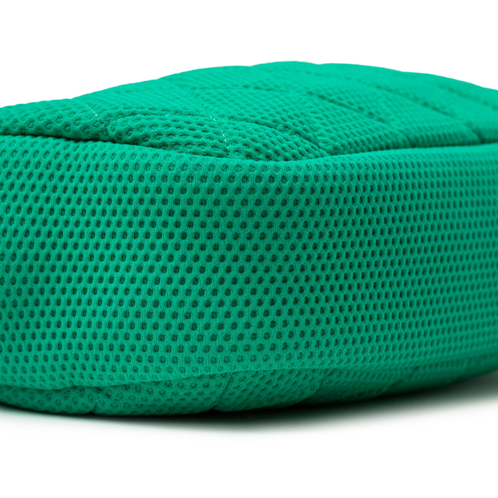 Close-up angled view of bottom corner of Chanel CC Sport Jersey Bag Green White Chain showing textured green fabric