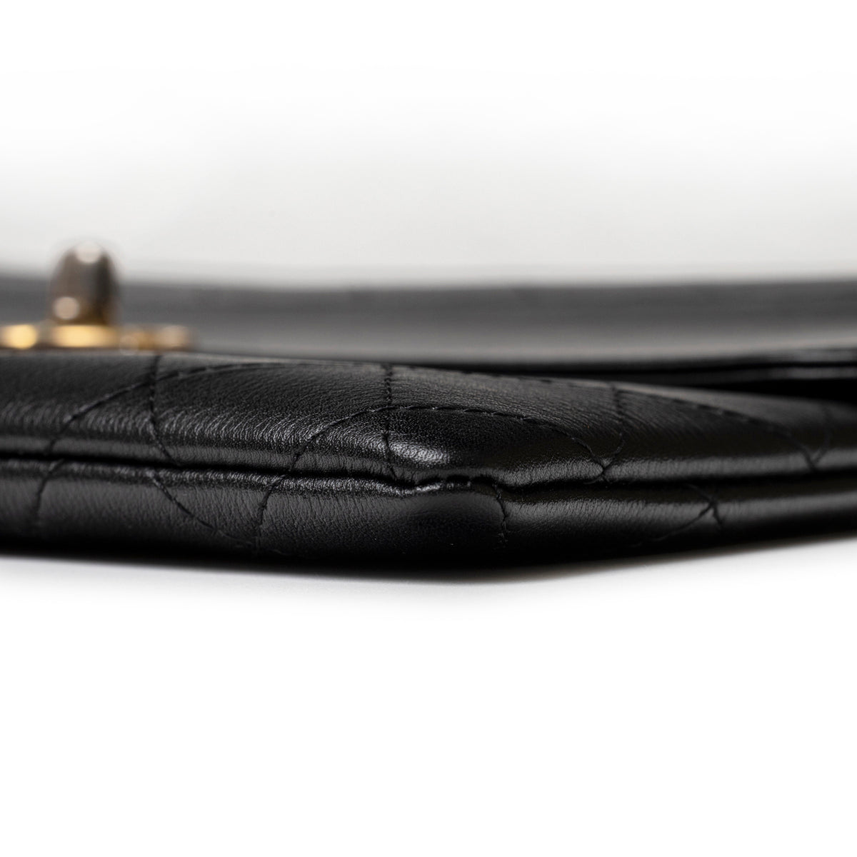 Chanel Clutch Black Quilted Lambskin Gold and Palladium Hardware edge detail