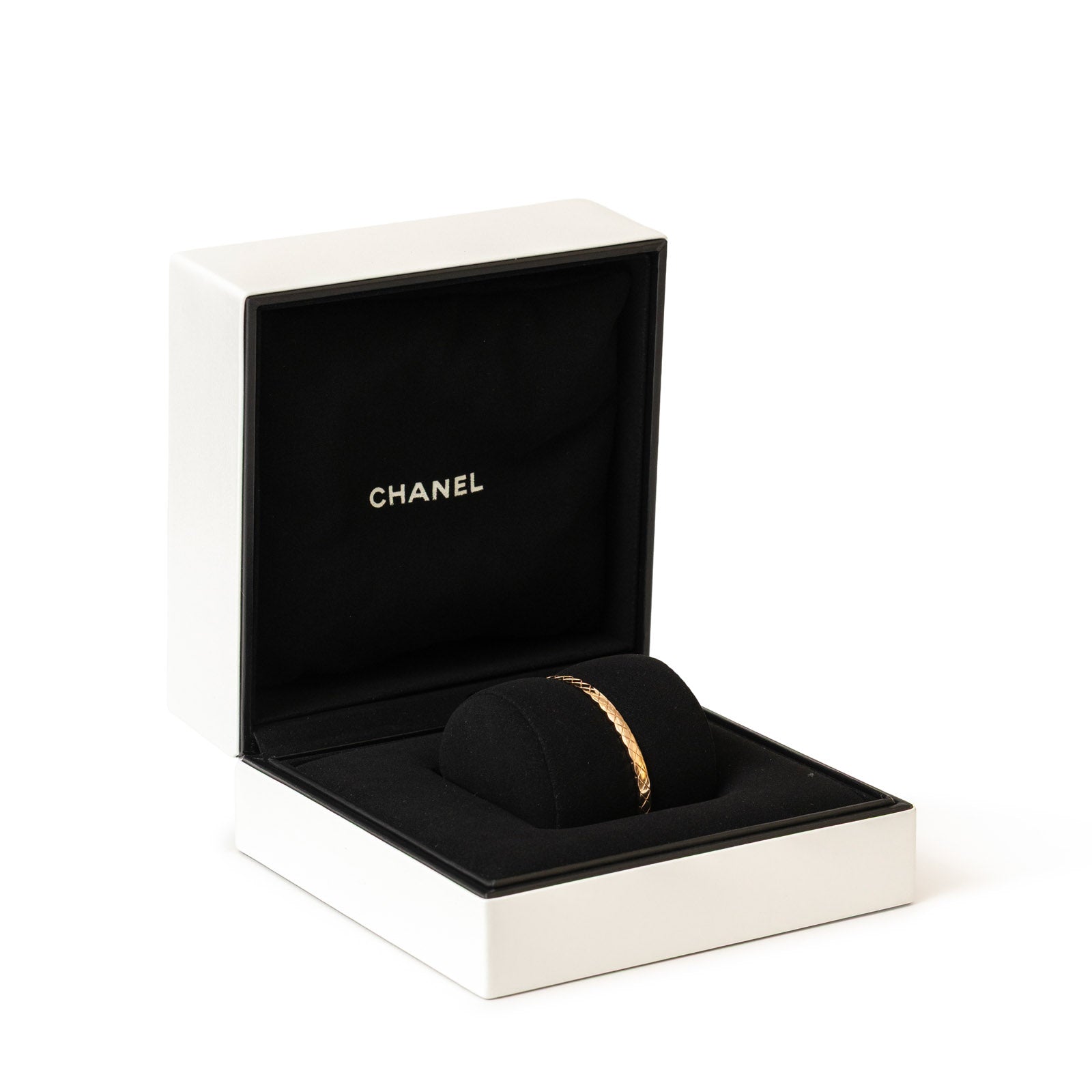 Chanel Coco Crush Mini Bracelet 18K Gold Au750 displayed in open white box with black velvet interior and Chanel logo inside lid