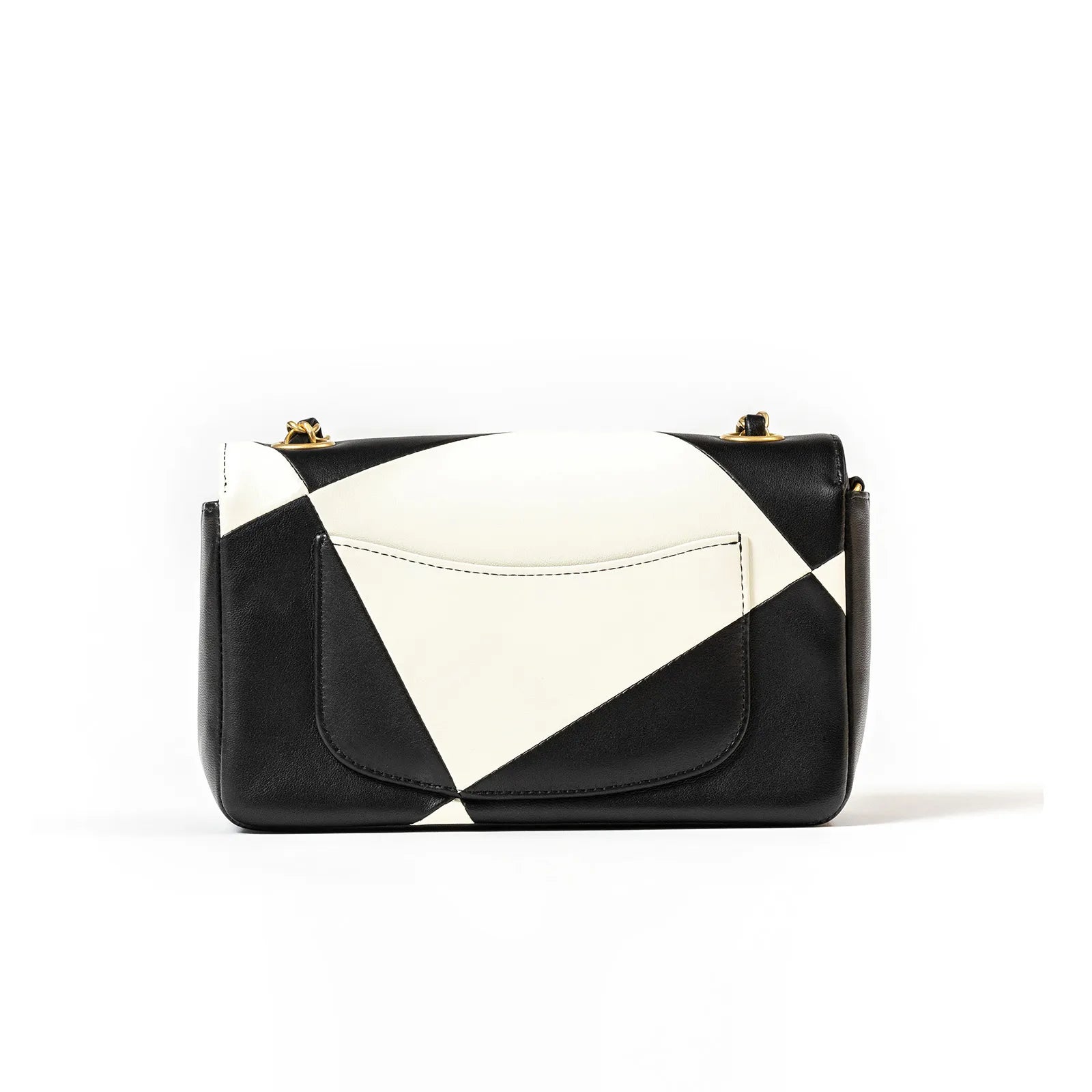 Back view of Chanel Geometric Patchwork Mini Flapbag Gold Hardware featuring black and white leather design with external pocket detail