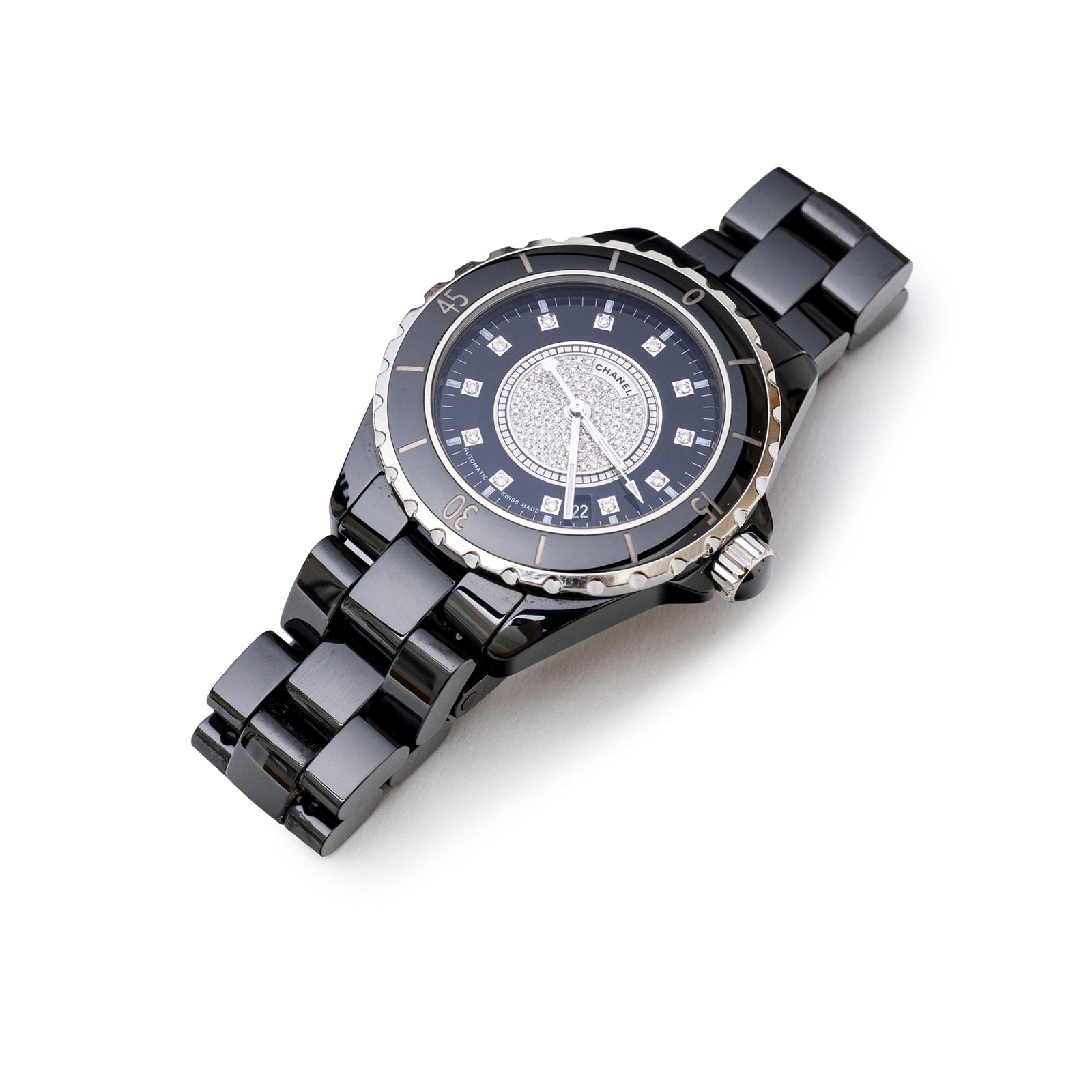 Angled shot of Chanel J12 38mm Ceramic Black Pave Diamond Quartz Watch showing diamond-studded dial and bracelet links