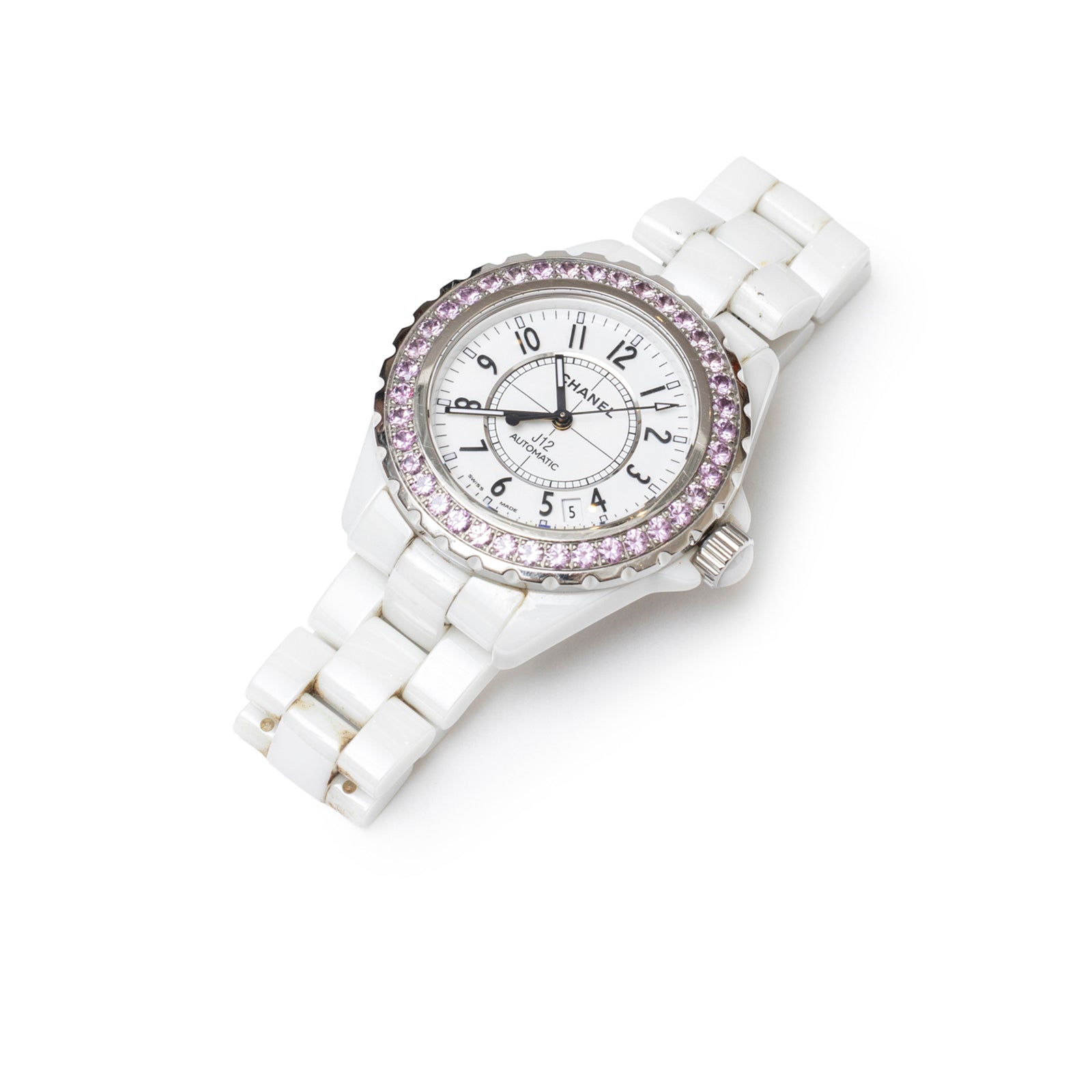 Angled view of Chanel J12 38mm Ceramic White Pink Sapphire Automatic Watch with white ceramic bracelet and pink sapphire bezel