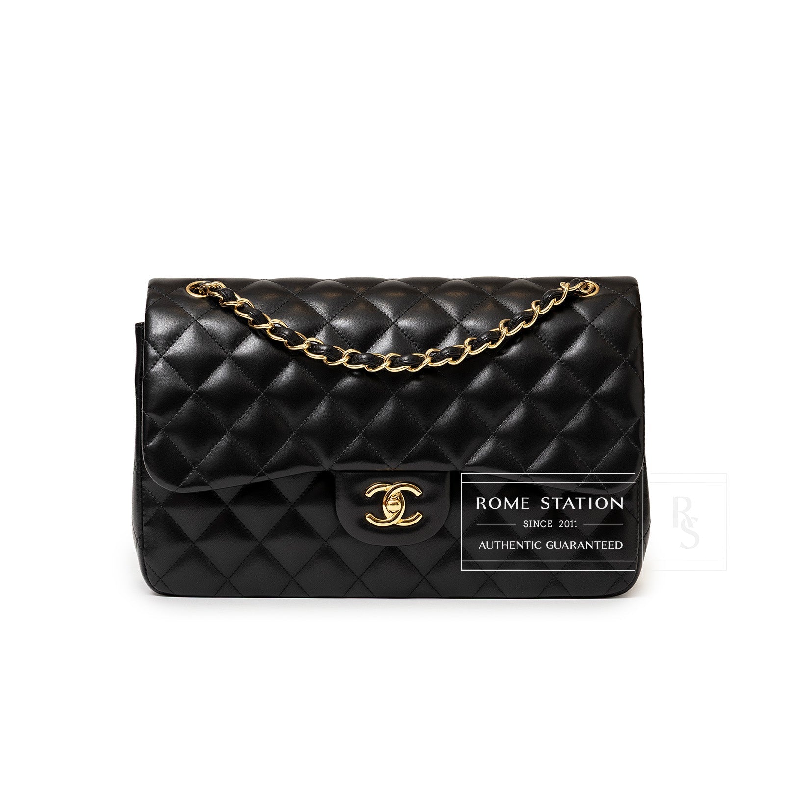 Front view of Chanel Jumbo Classic Double Flap Bag Black Lambskin Gold Hardware showing quilted design and chain strap